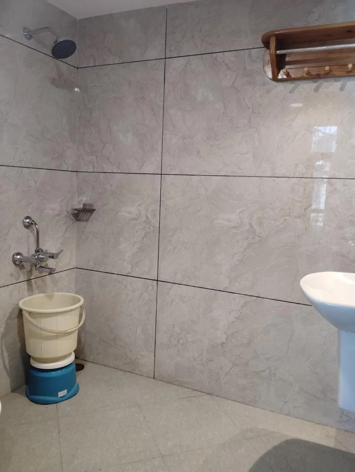 Bathroom in Hotel CM Palace - Pure Vegetarian