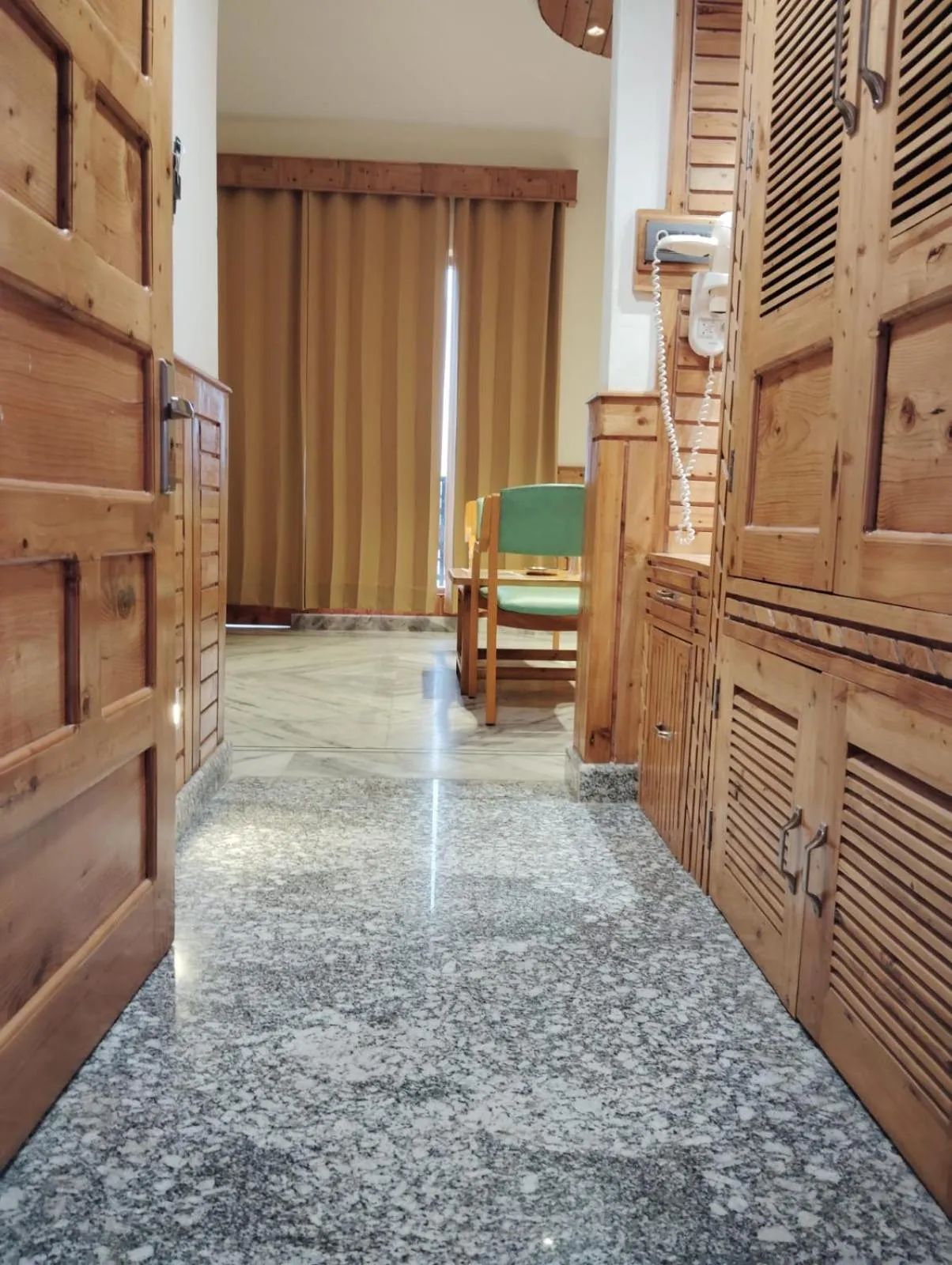 Bedroom in Hotel CM Palace - Pure Vegetarian