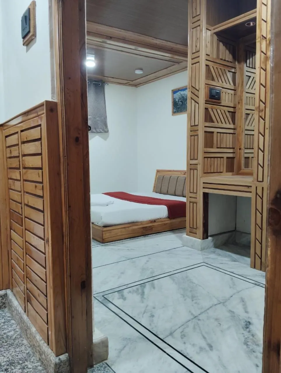 Bedroom in Hotel CM Palace - Pure Vegetarian