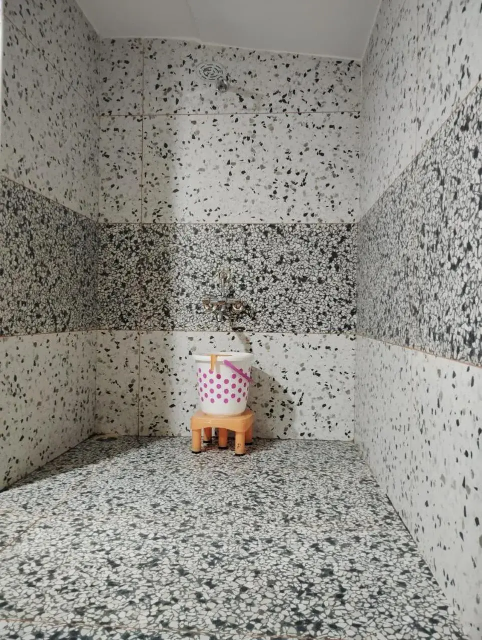 Bathroom in Hotel CM Palace - Pure Vegetarian Bathroom in Hotel CM Palace - Pure Vegetarian