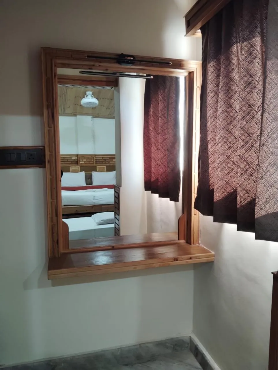 Bedroom in Hotel CM Palace - Pure Vegetarian