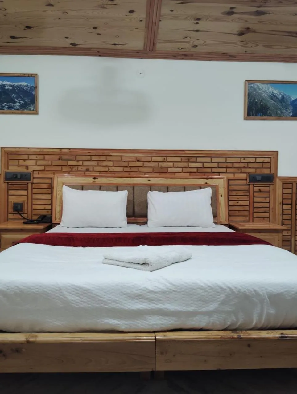 Bed in Hotel CM Palace - Pure Vegetarian