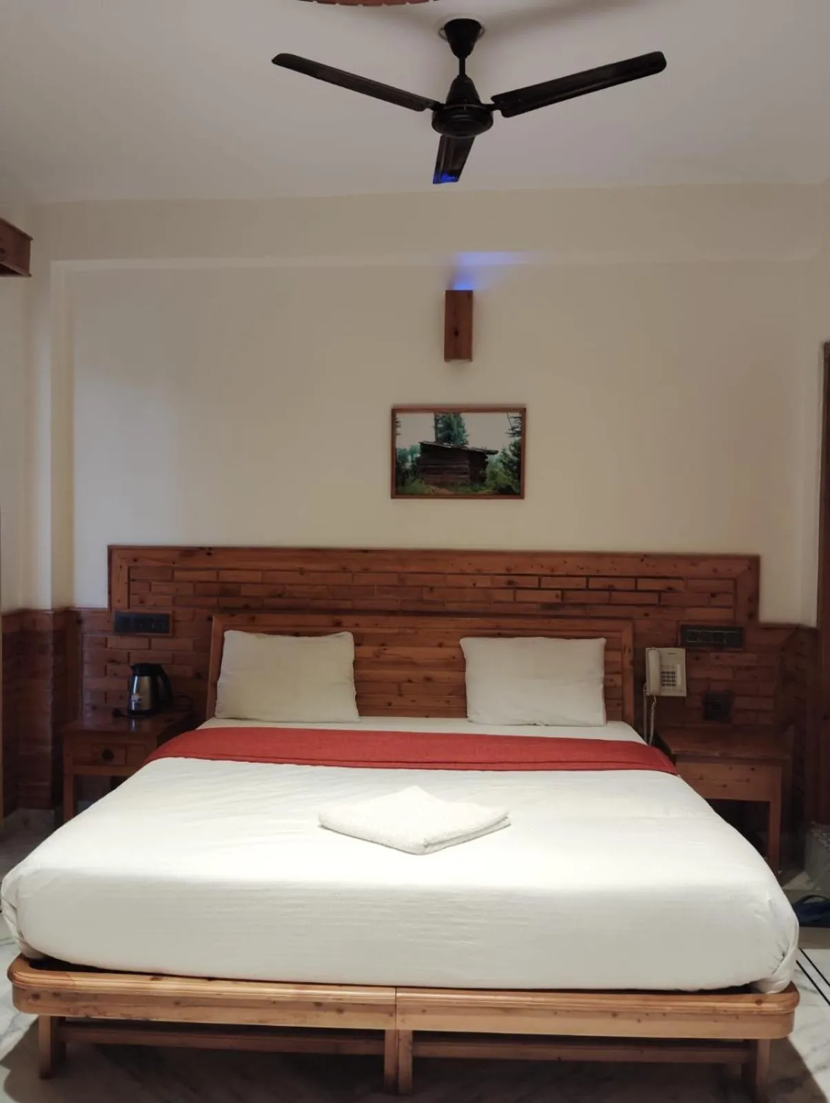 Bed in Hotel CM Palace - Pure Vegetarian