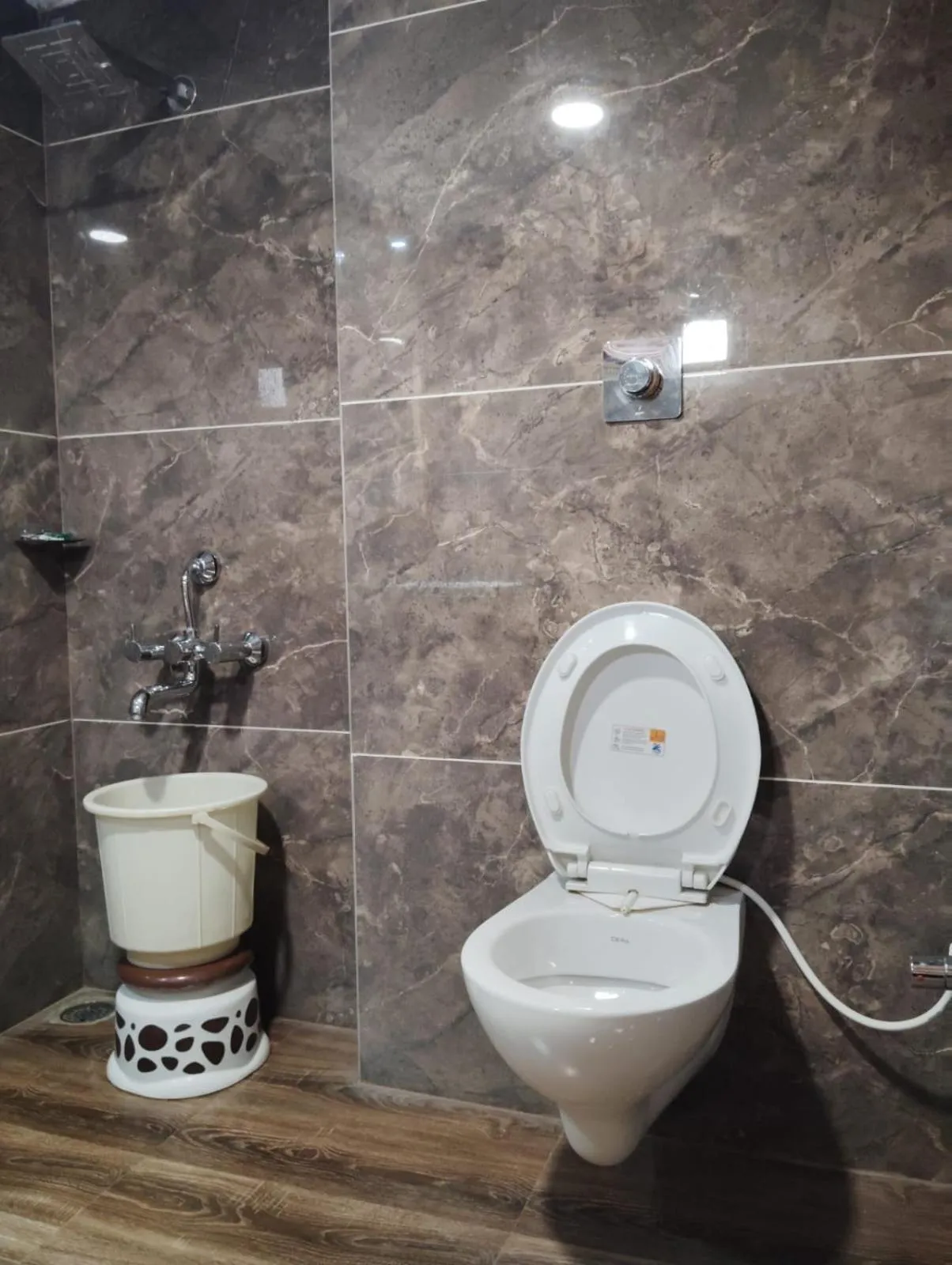 Toilet in Hotel CM Palace - Pure Vegetarian