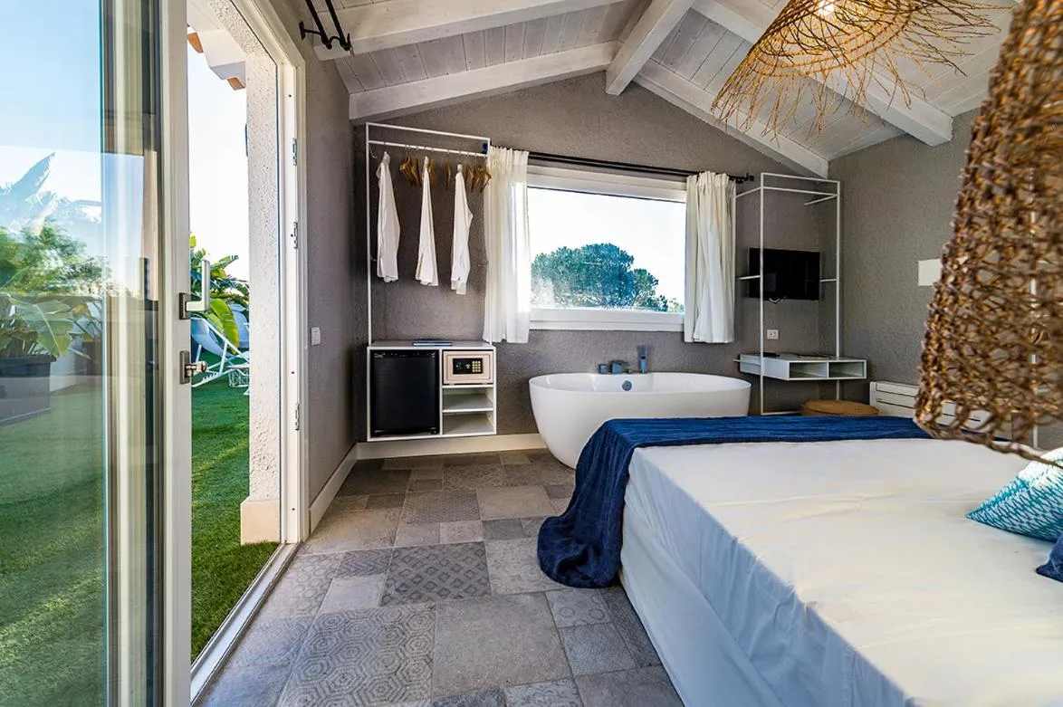 Bed in CapoBlu Hotel