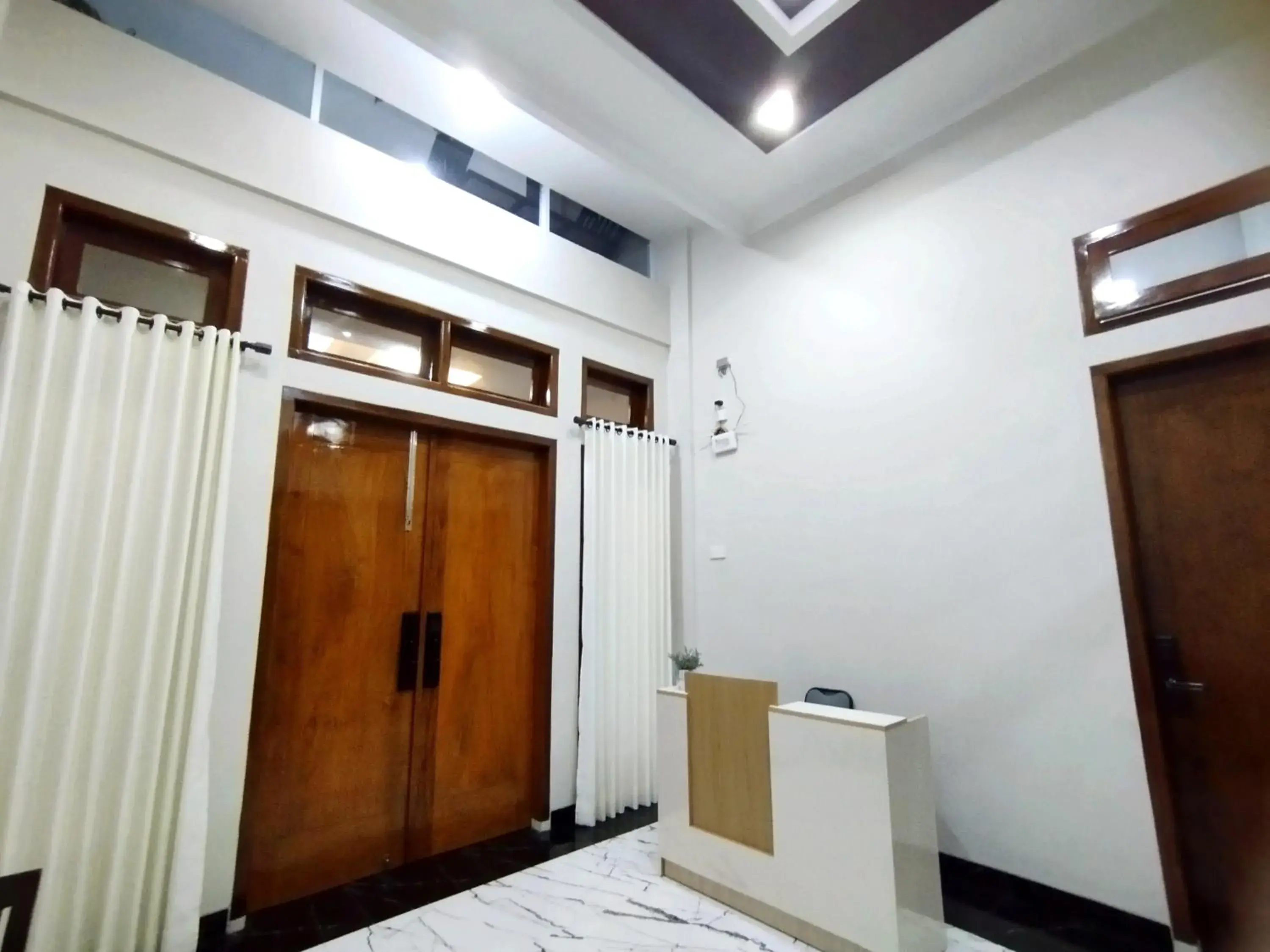 Lobby or reception, Bed in Saira Hotel dan Homestay Syariah Lobby or reception, Bed in Saira Hotel dan Homestay Syariah