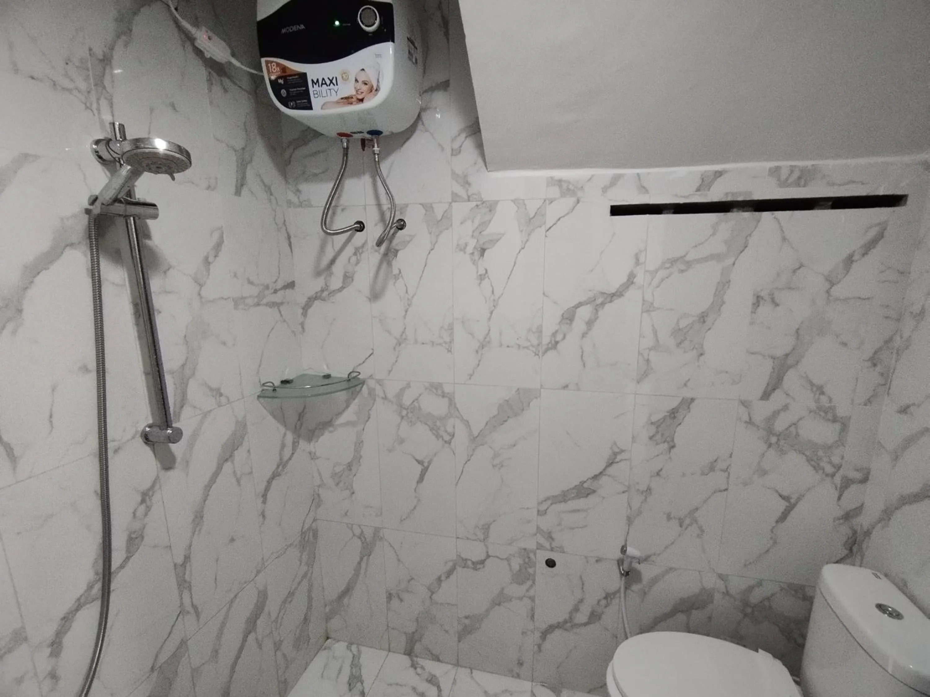 Bathroom in Saira Hotel dan Homestay Syariah