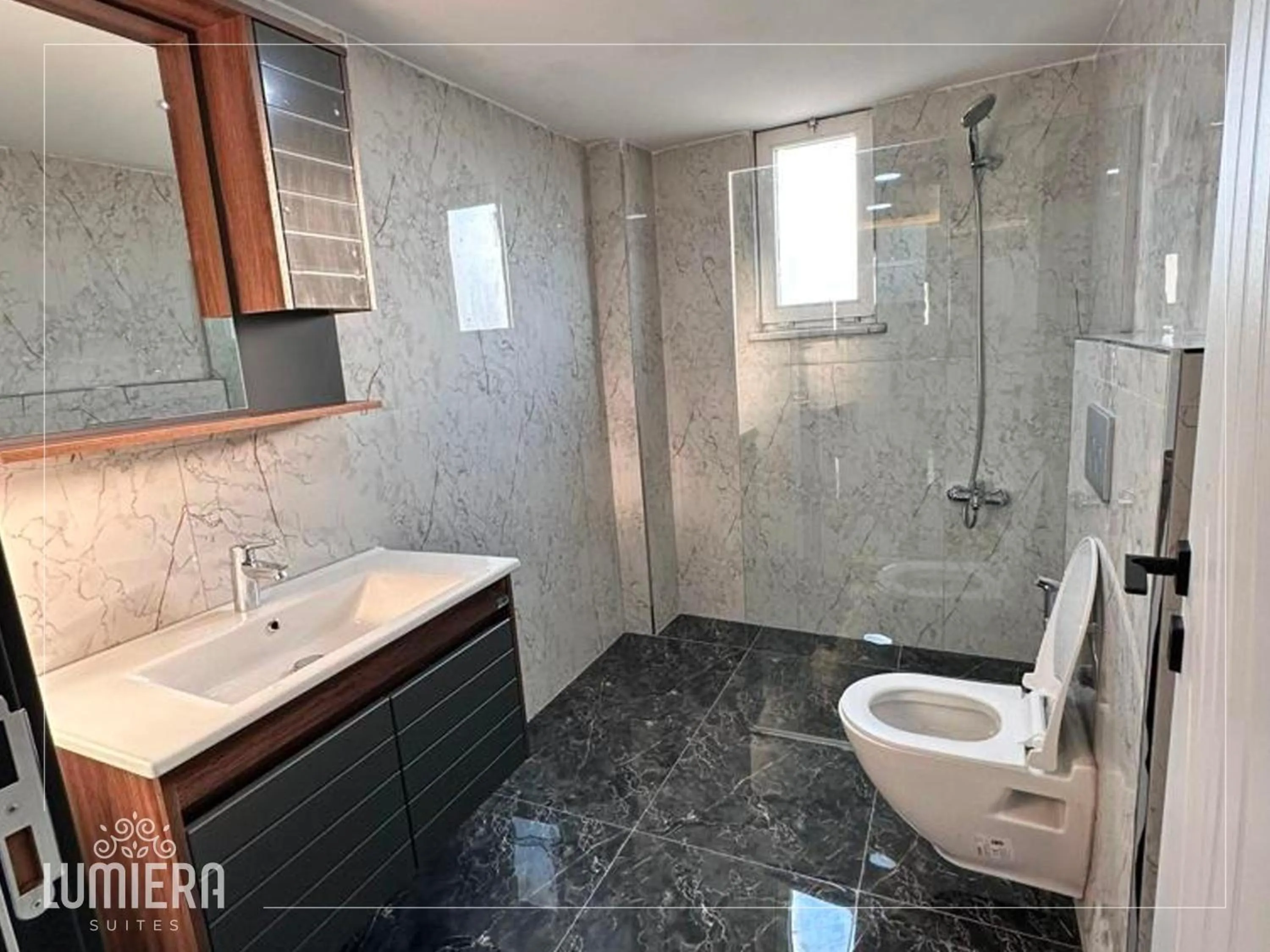 Shower in Lumiera Suites Hotel