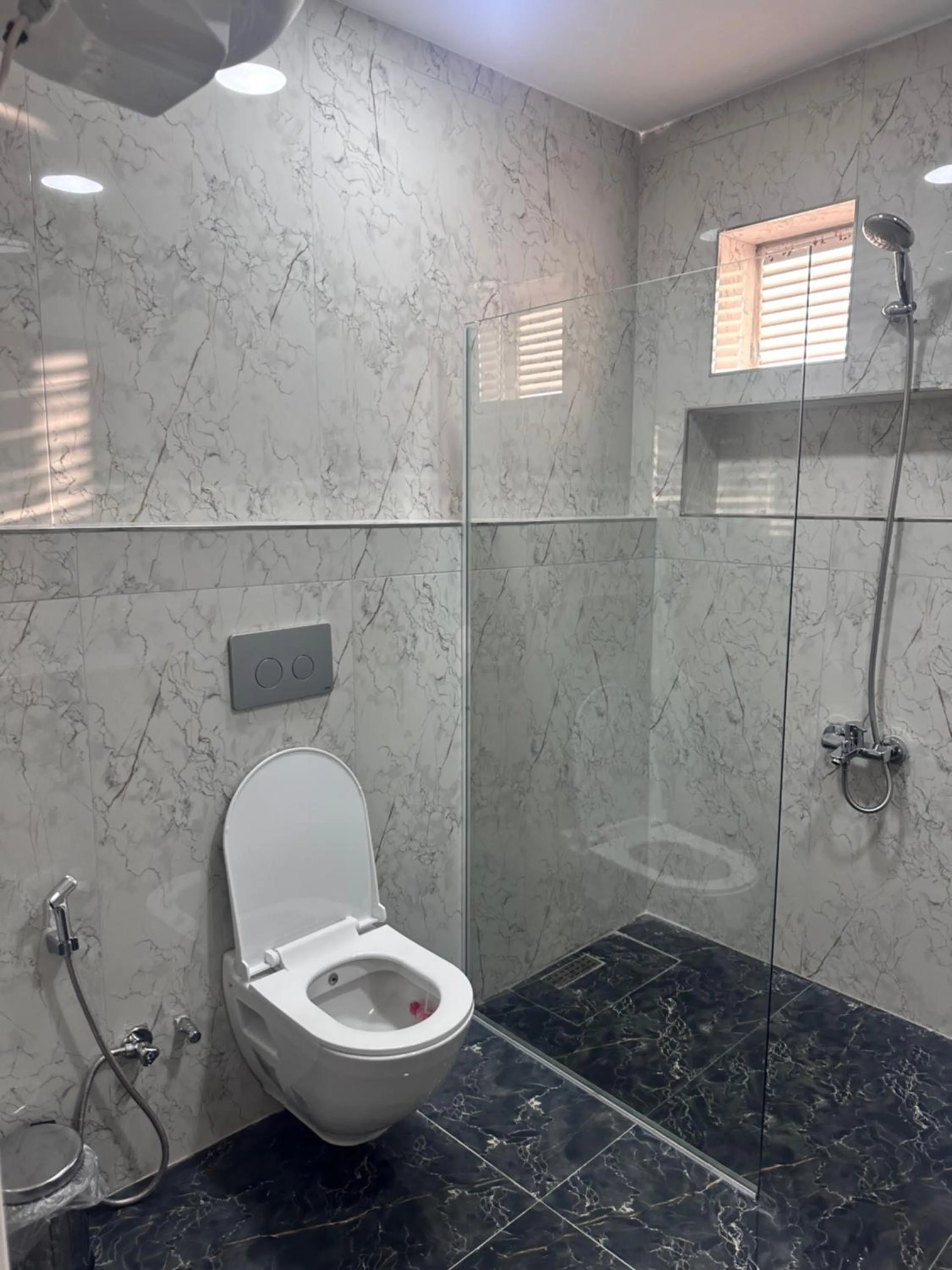 Shower in Lumiera Suites Hotel