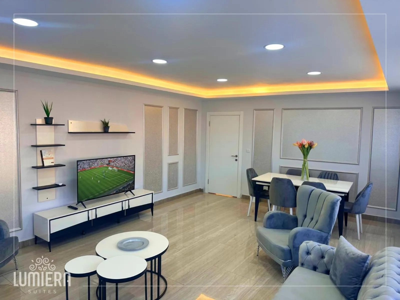 Communal lounge/ TV room in Lumiera Suites Hotel