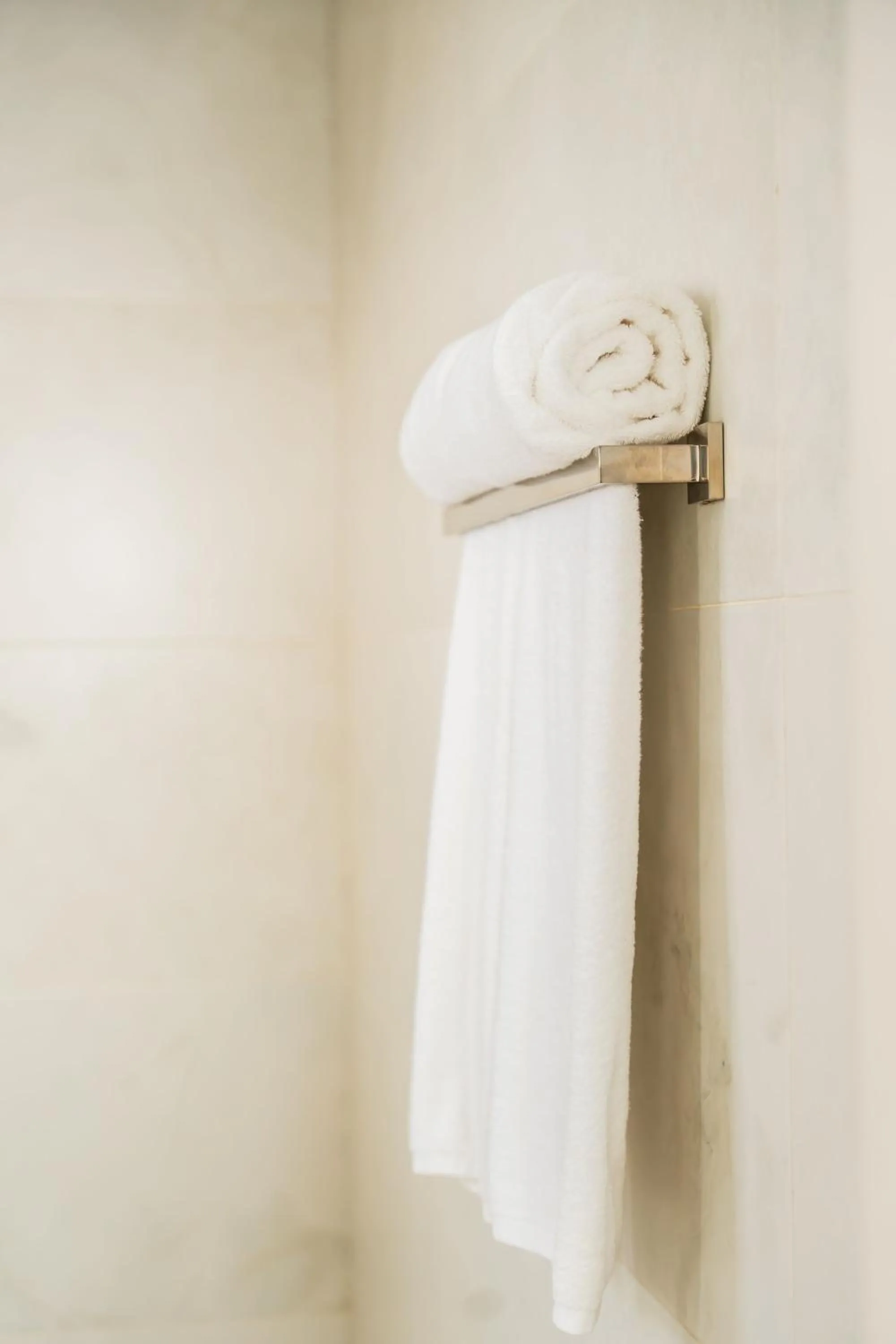 towels in Hotel Stay Here Suites