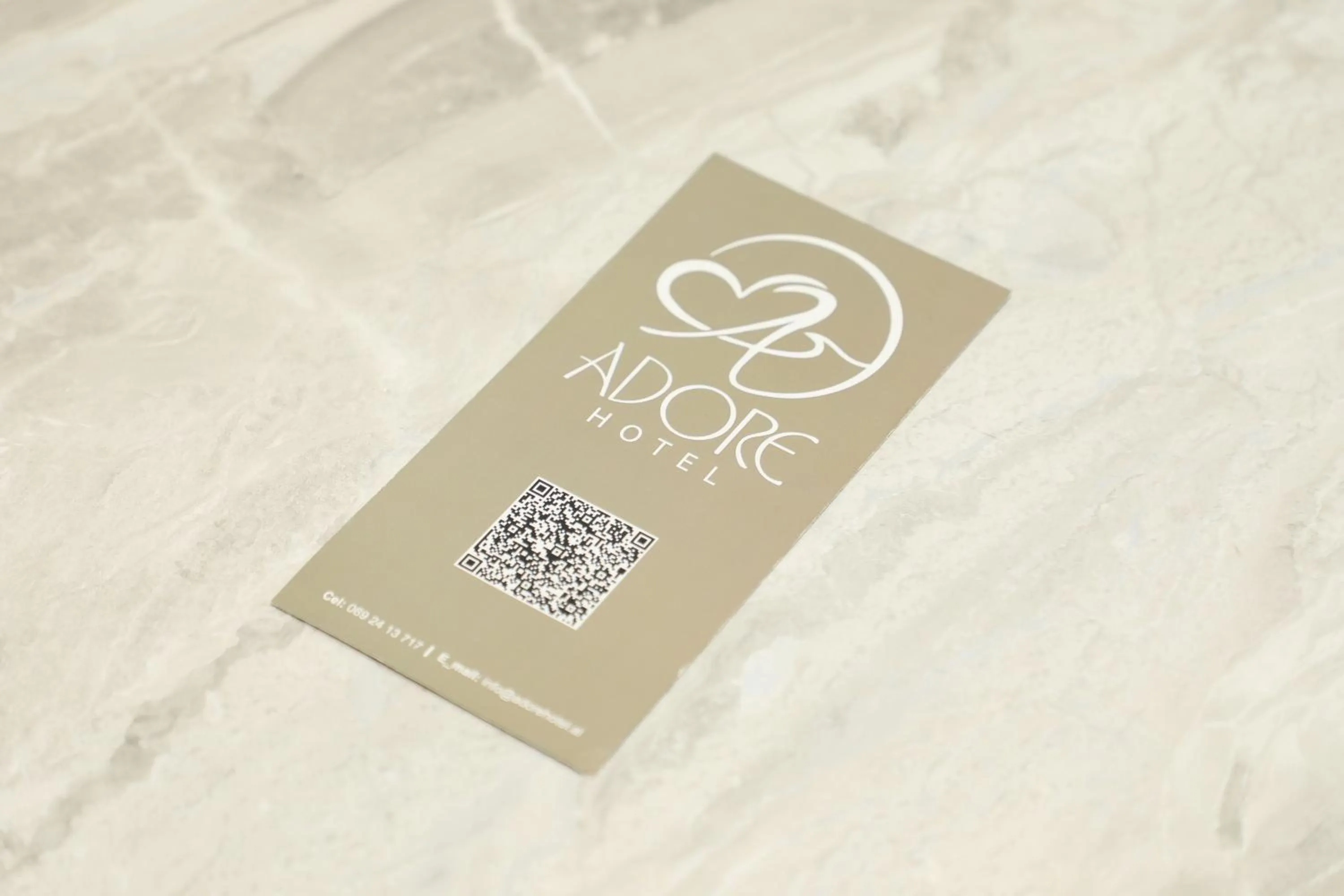 Logo/Certificate/Sign in Hotel Adore