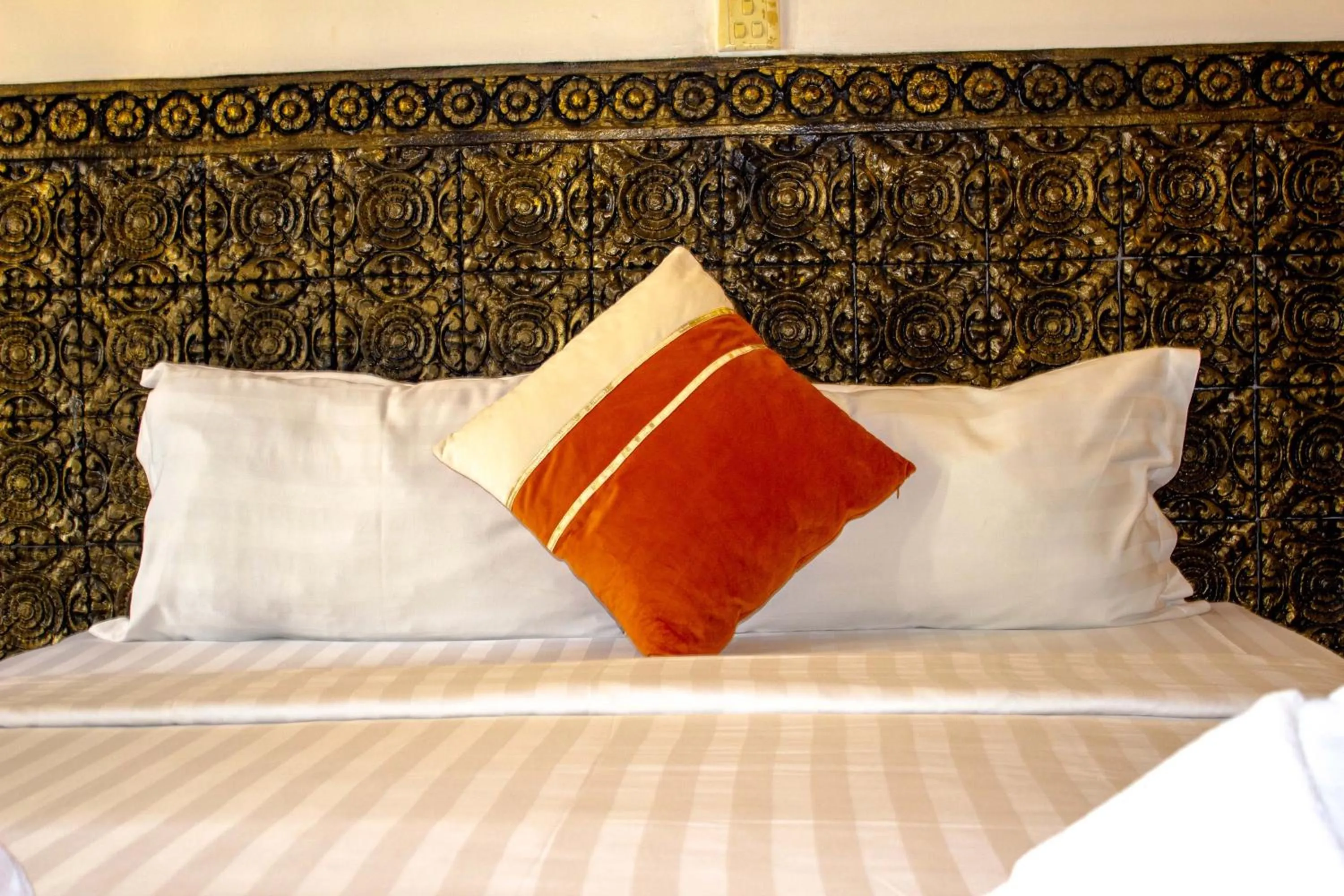 Bed in Le Hotel Hotel Phnom Penh