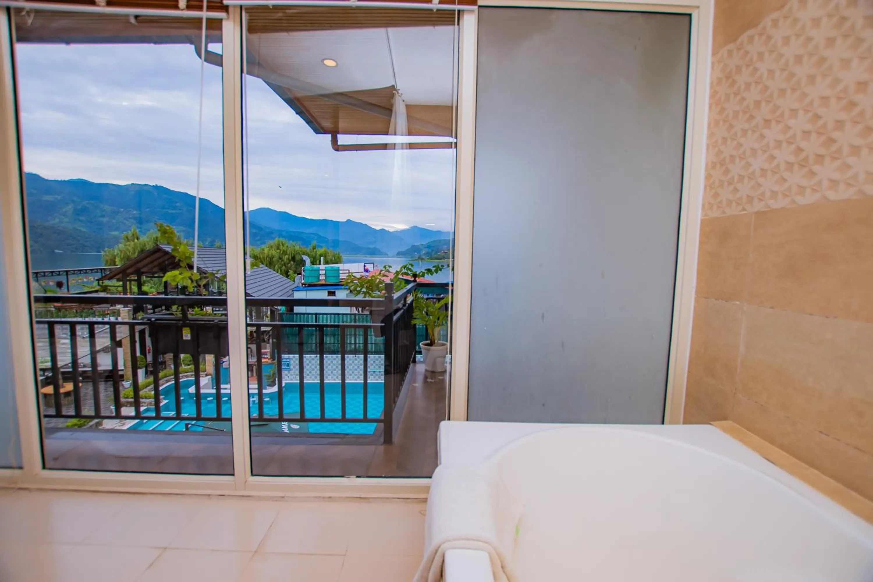 View (from property/room), Bed in Majestic Lake Front Hotel & Suites