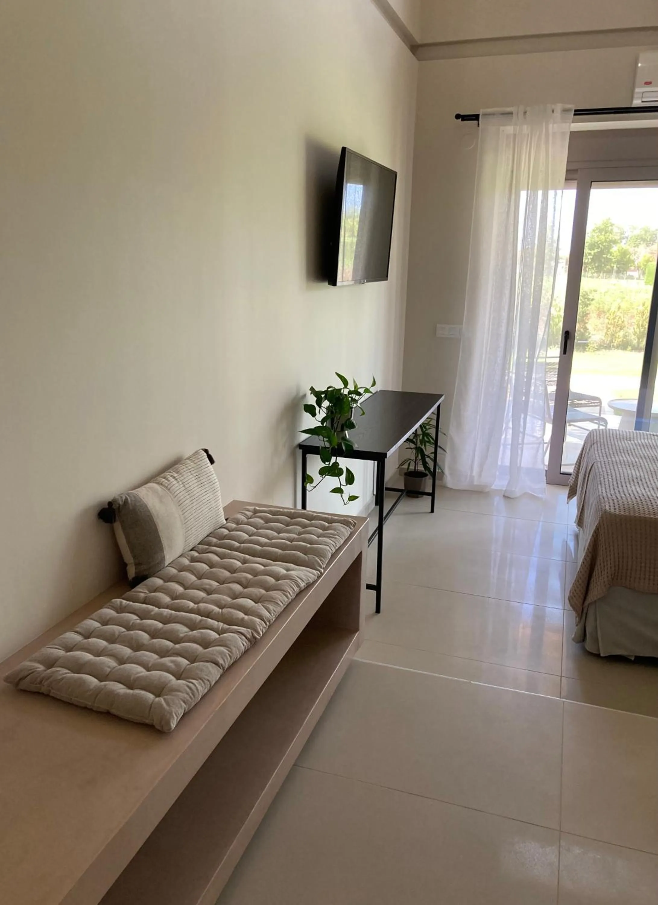 Seating area, Bed in Pnoe Eco Residences