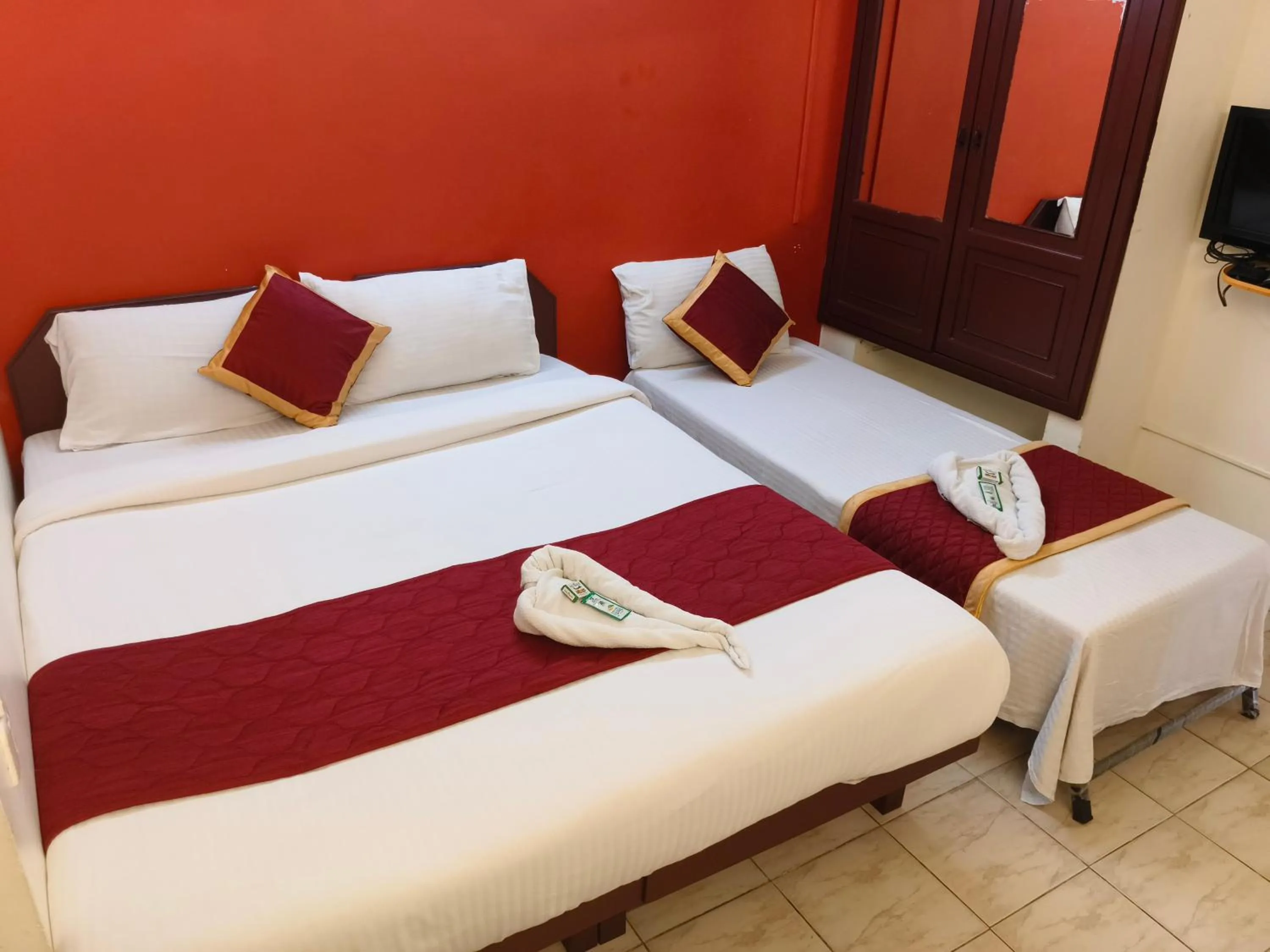 Bed in Hotel Gamas Inn