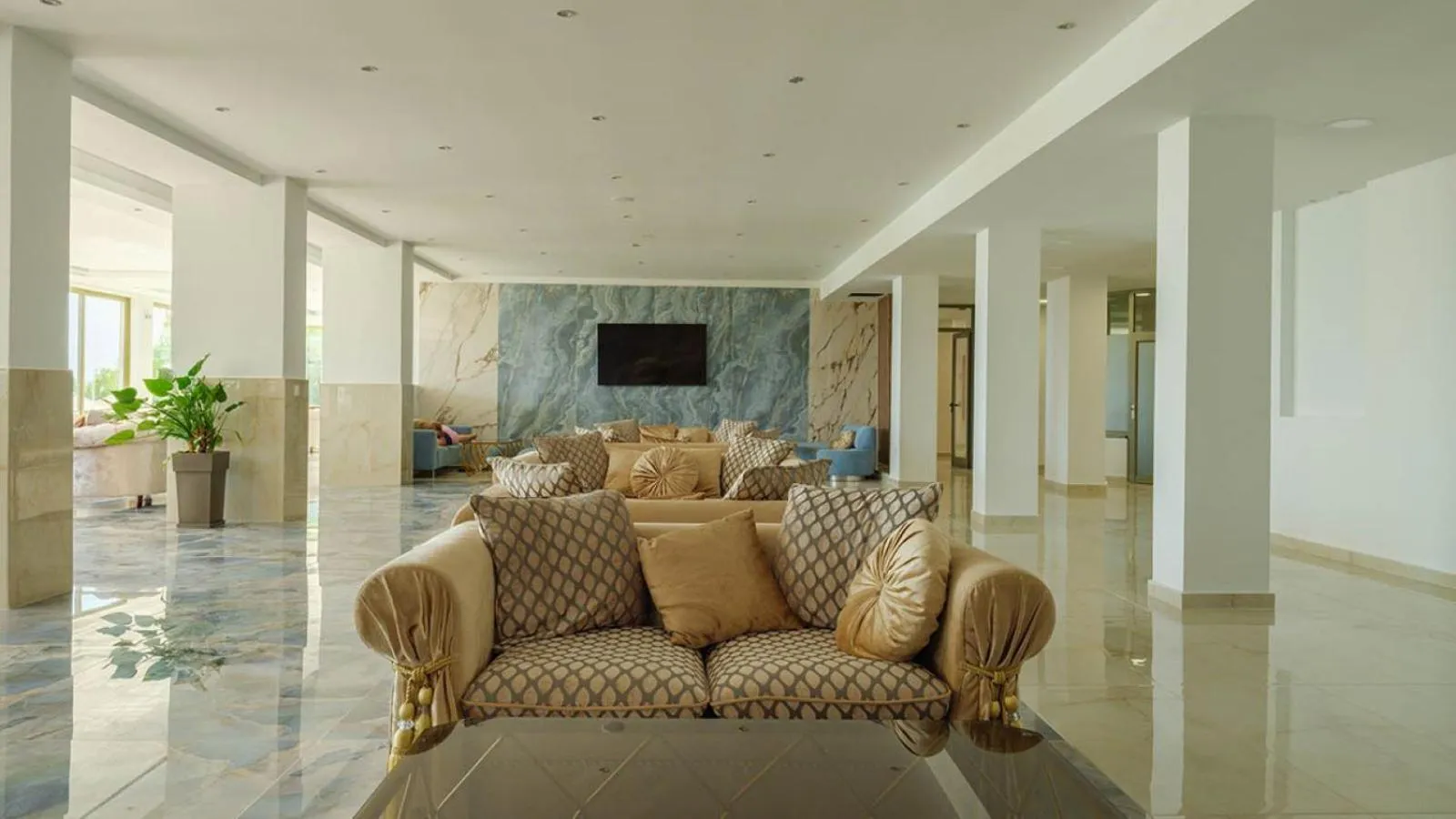 Communal lounge/ TV room in Ninos Grand Beach Resort