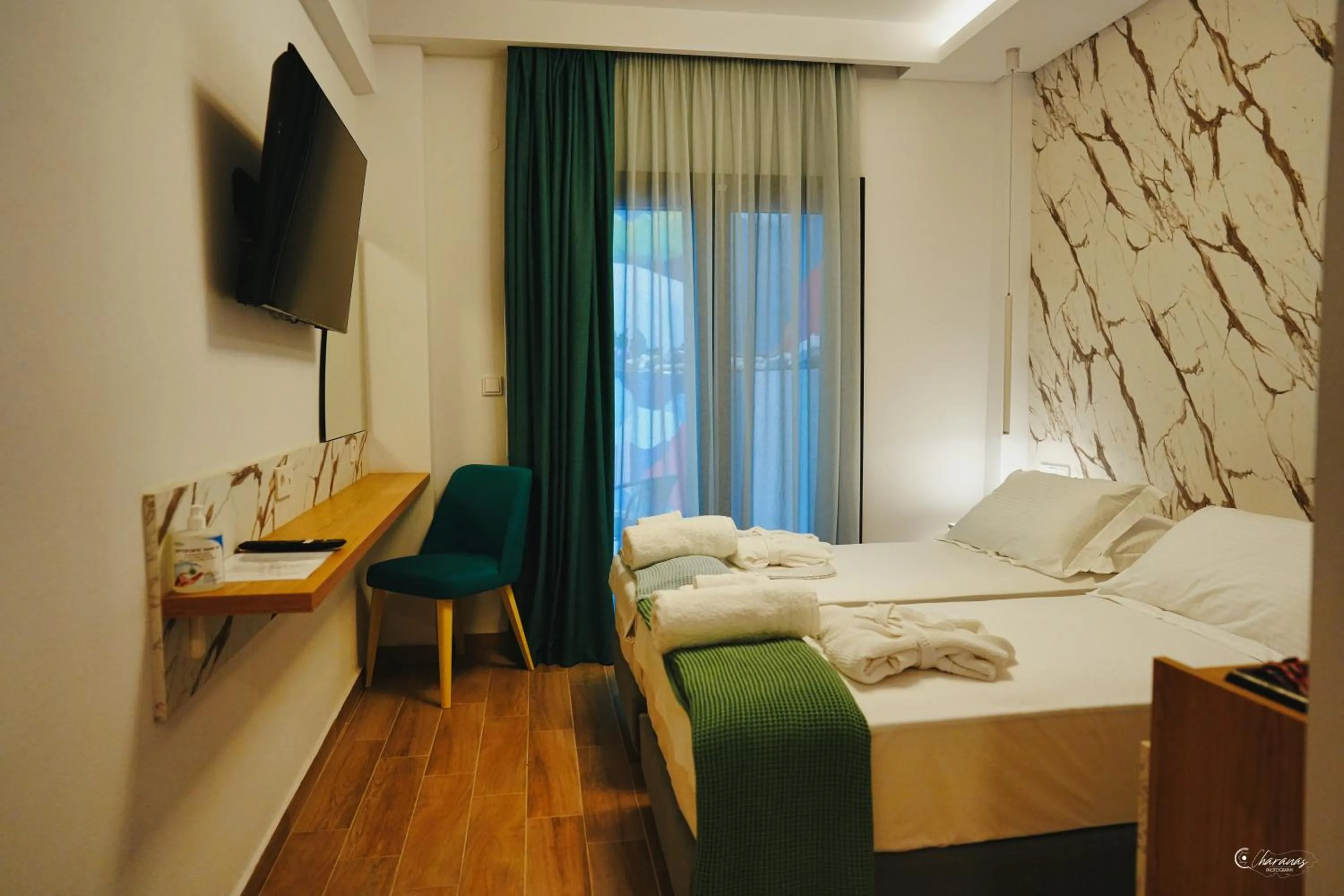 Bed in Electra Suites