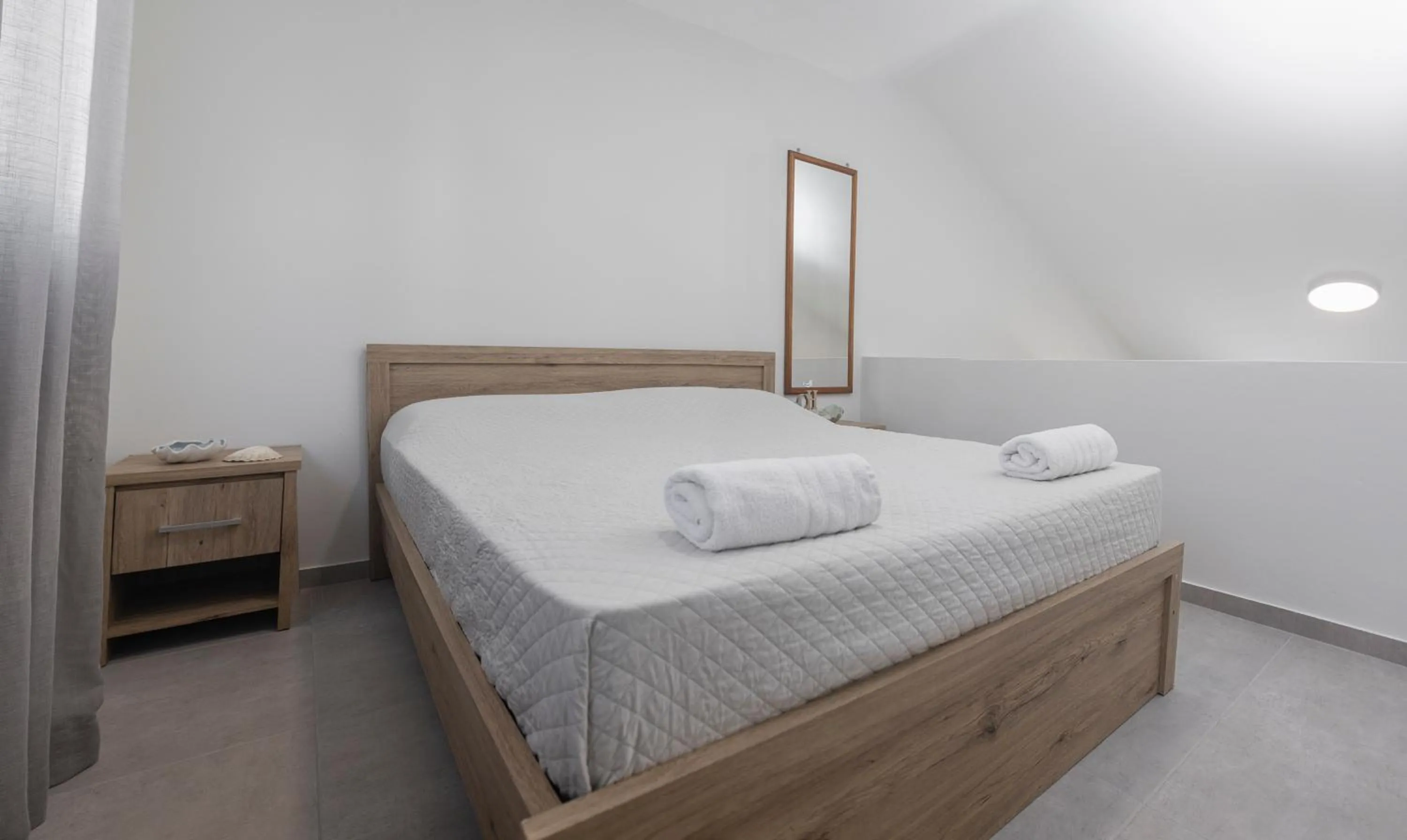 Bed in Lovely Studio by the Beach