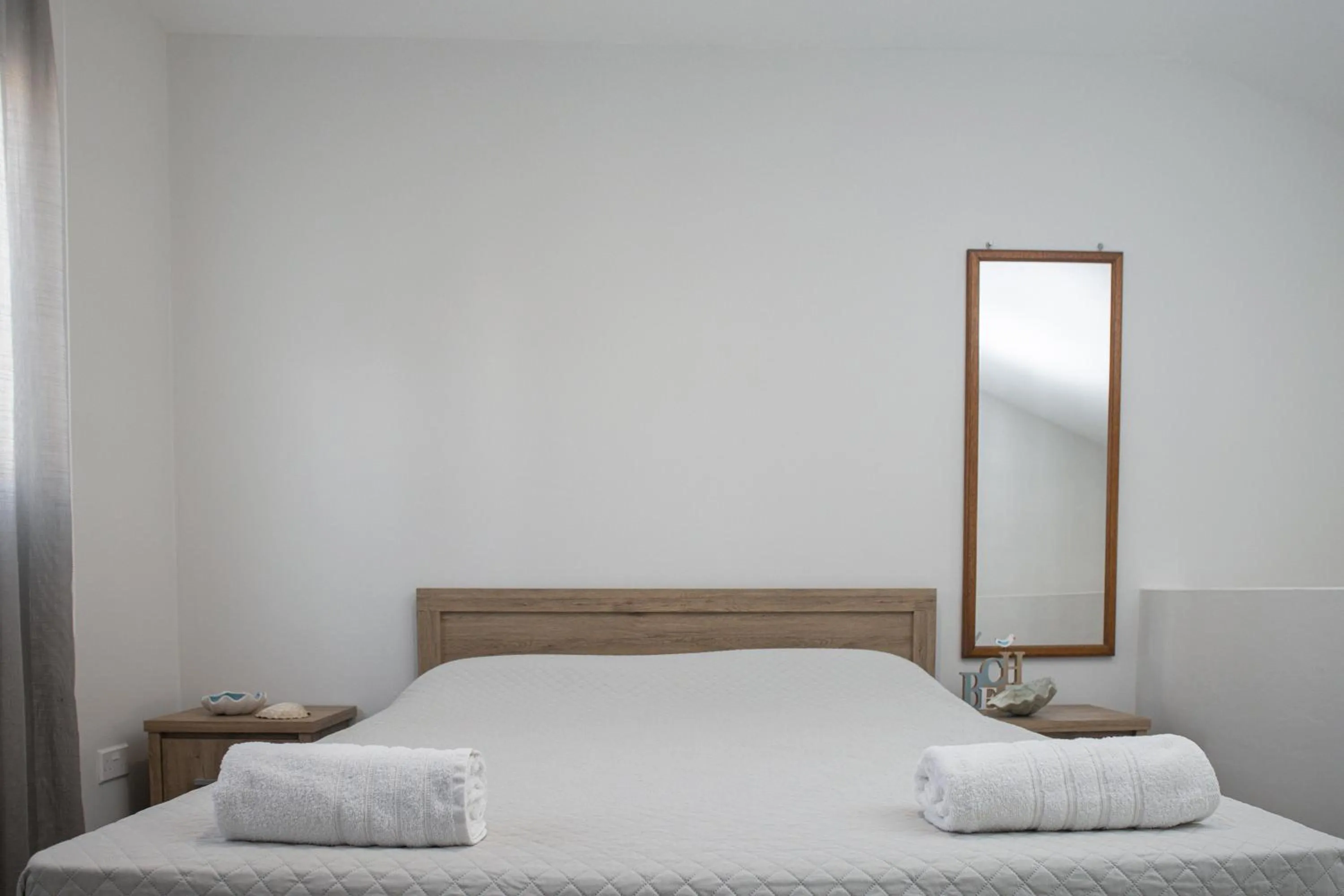Bed in Lovely Studio by the Beach