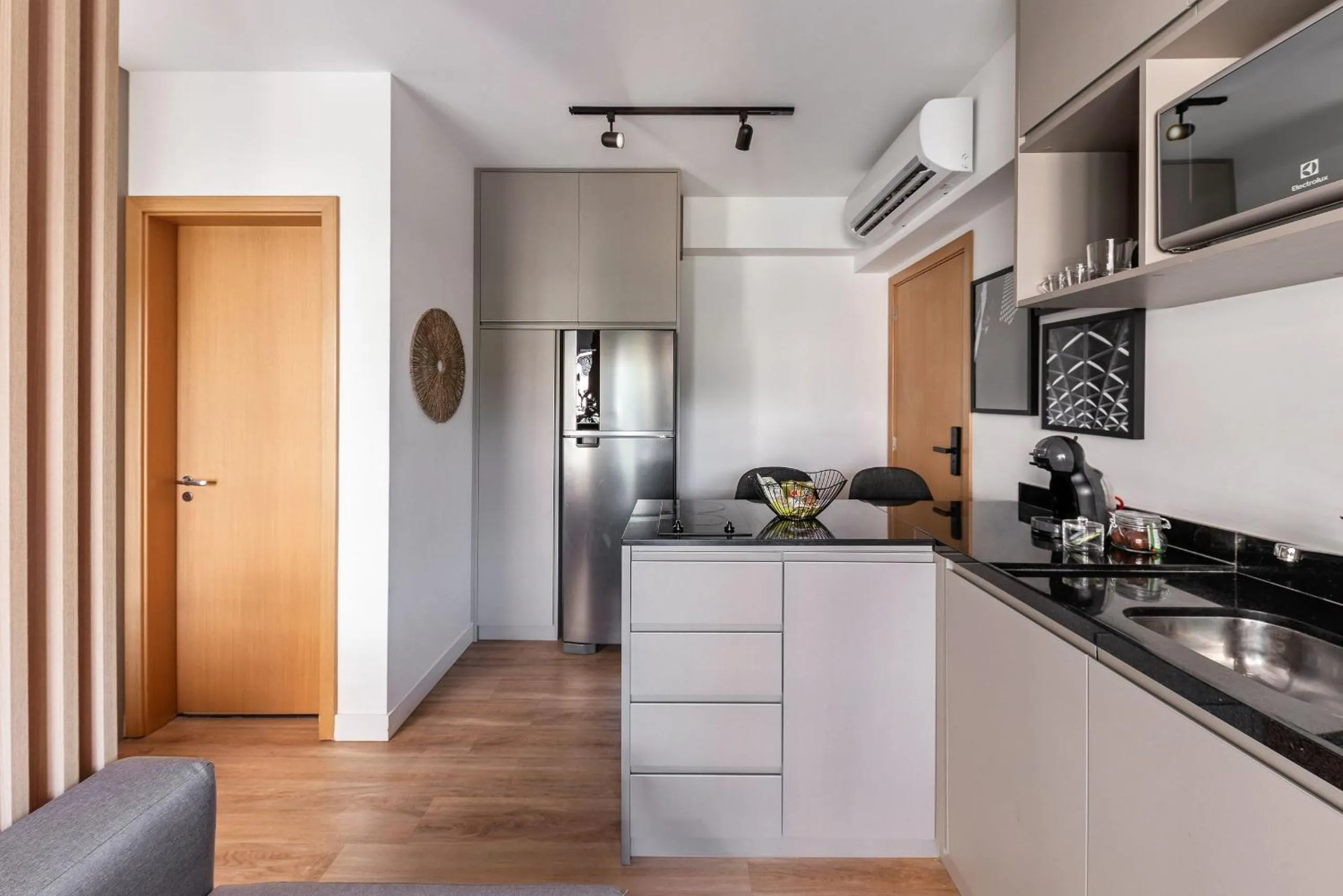 Kitchen or kitchenette in Homelike by Viva - Apartamentos completos em Pinheiros a uma quadra da Faria Lima