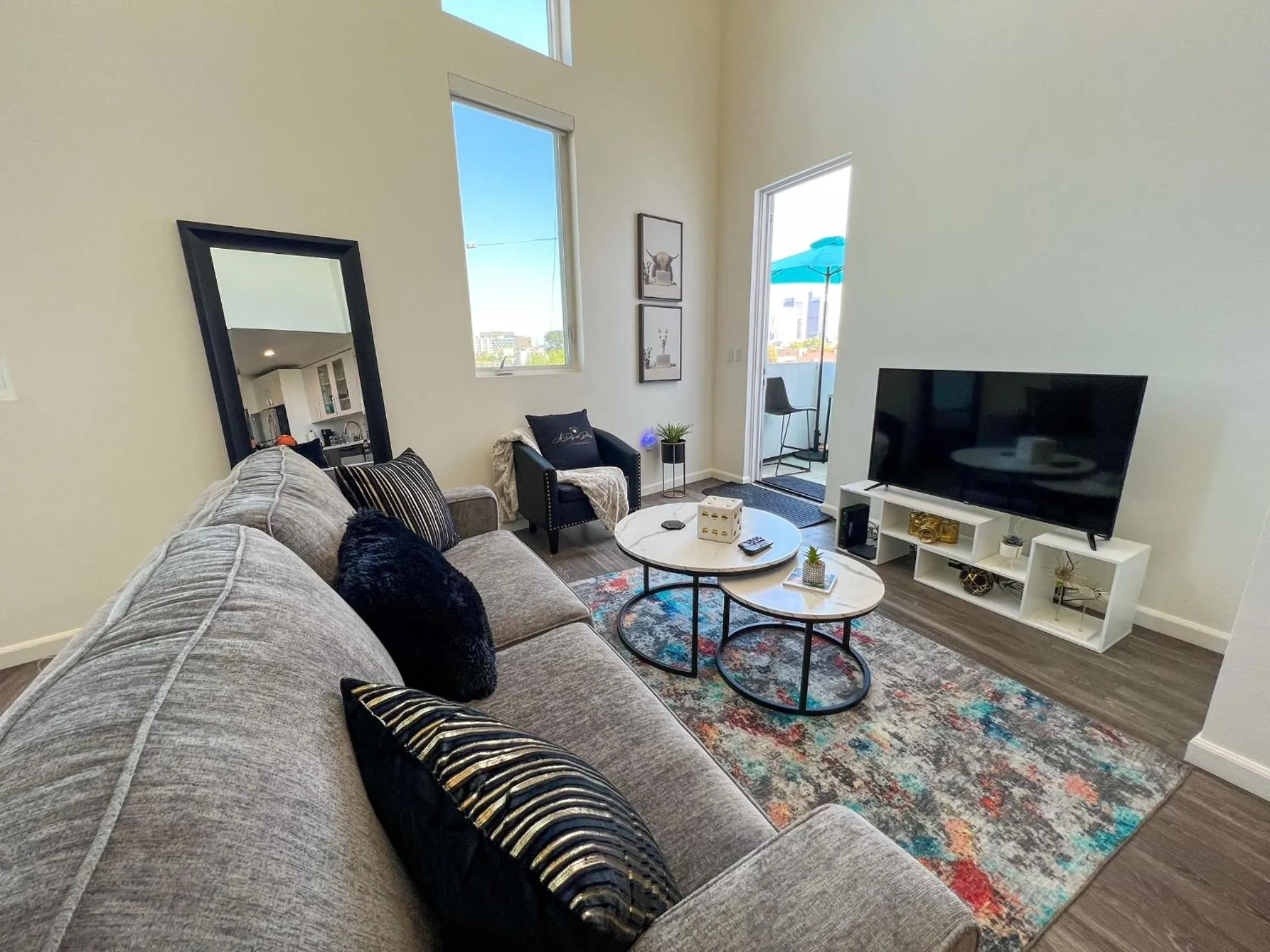 TV and multimedia in Downtown Los Angeles Skyline balcony view Modern Penthouse