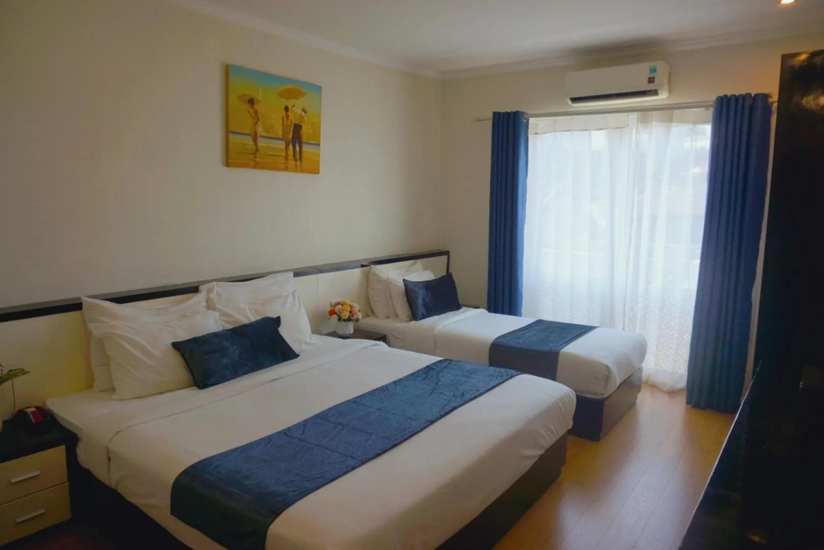 Bed in Rising Dragon Hotel