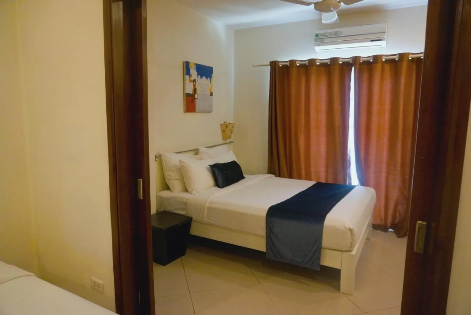 Bed in Rising Dragon Hotel