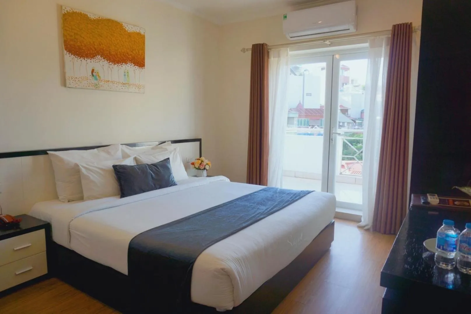 Bed in Rising Dragon Hotel