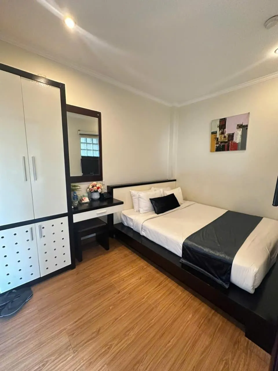 Photo of the whole room, Bed in Rising Dragon Hotel