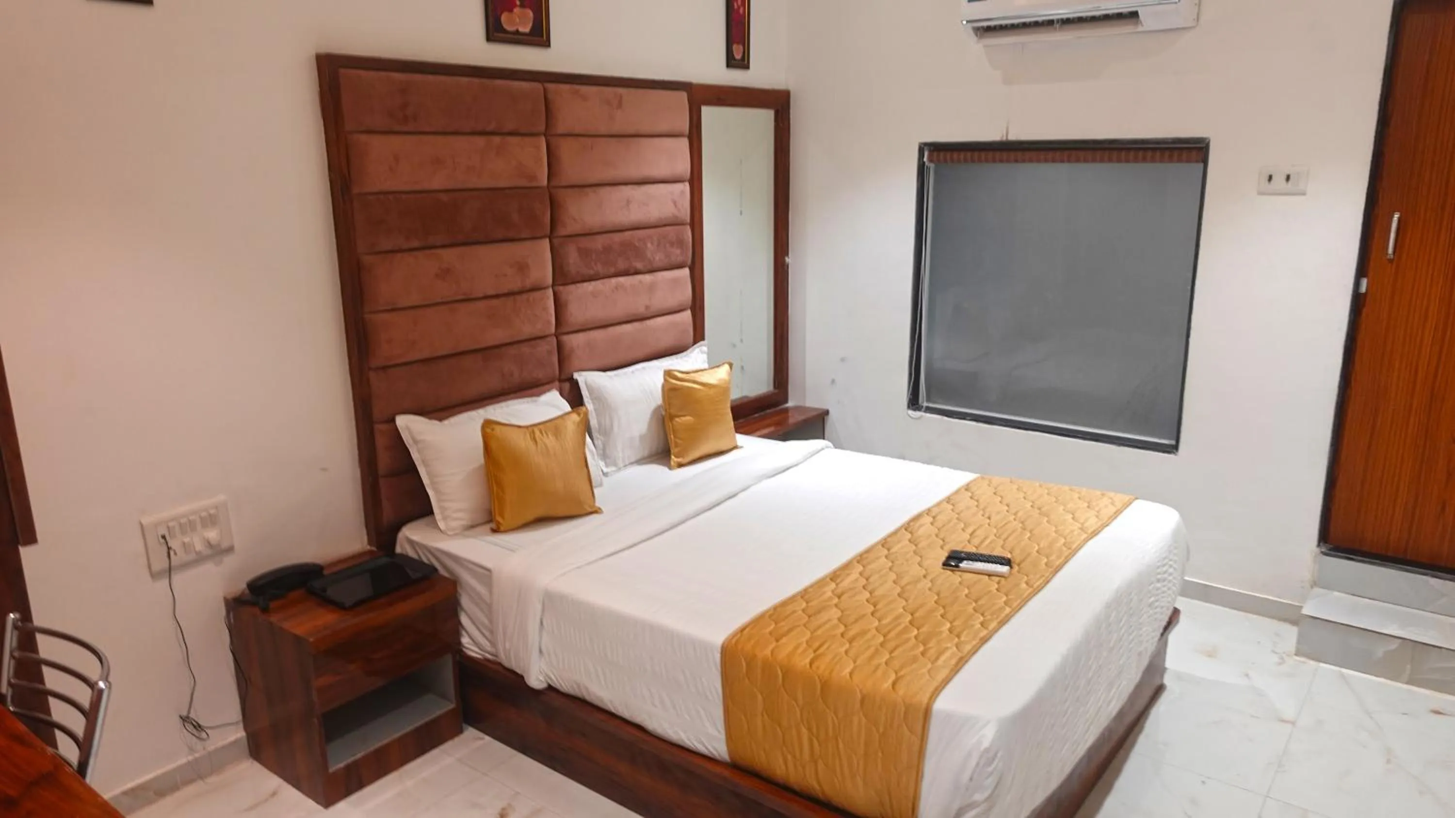 Bedroom, Bed in Hotel Palms Residency, Chembur Mumbai