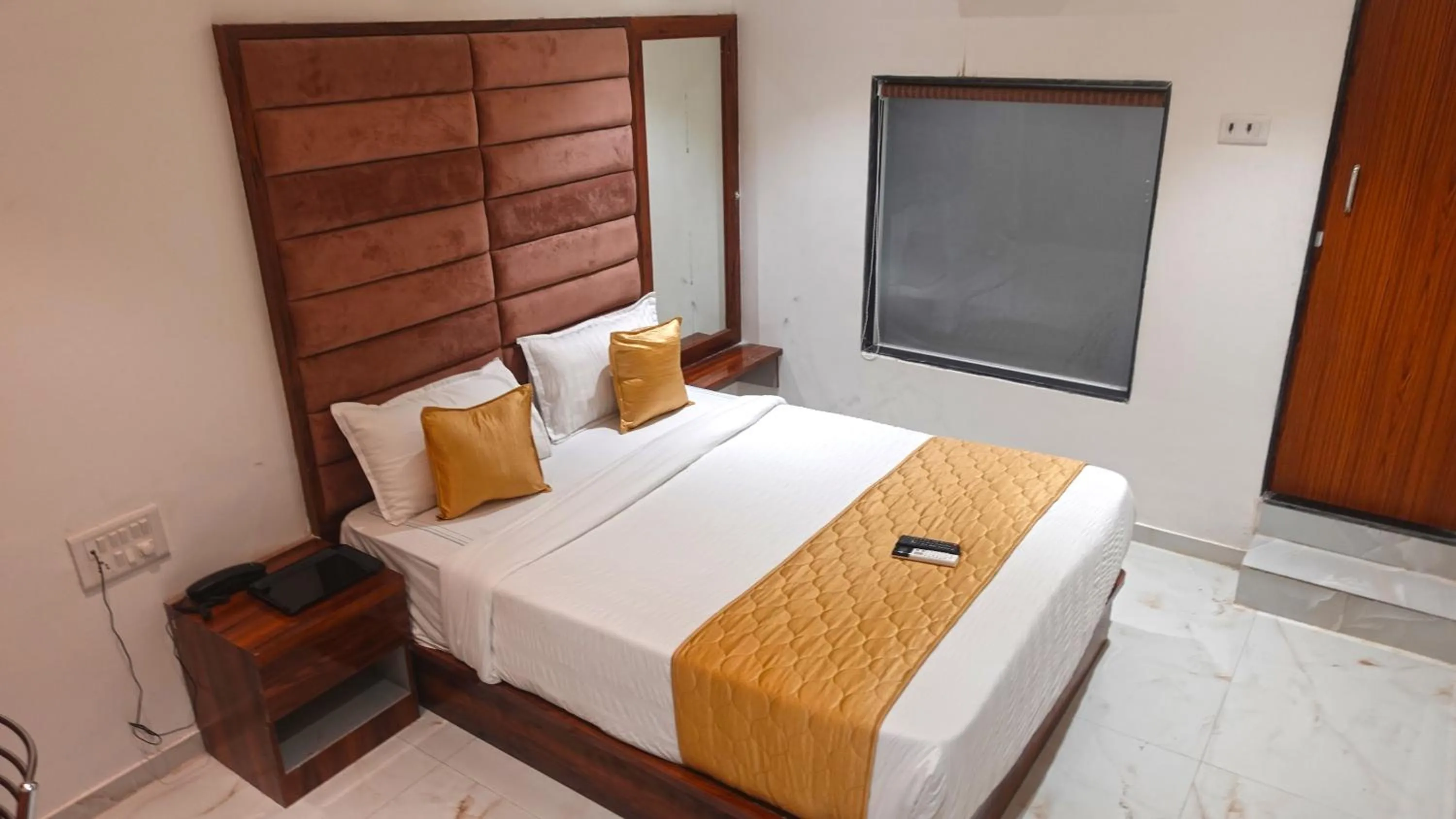 Bedroom, Bed in Hotel Palms Residency, Chembur Mumbai