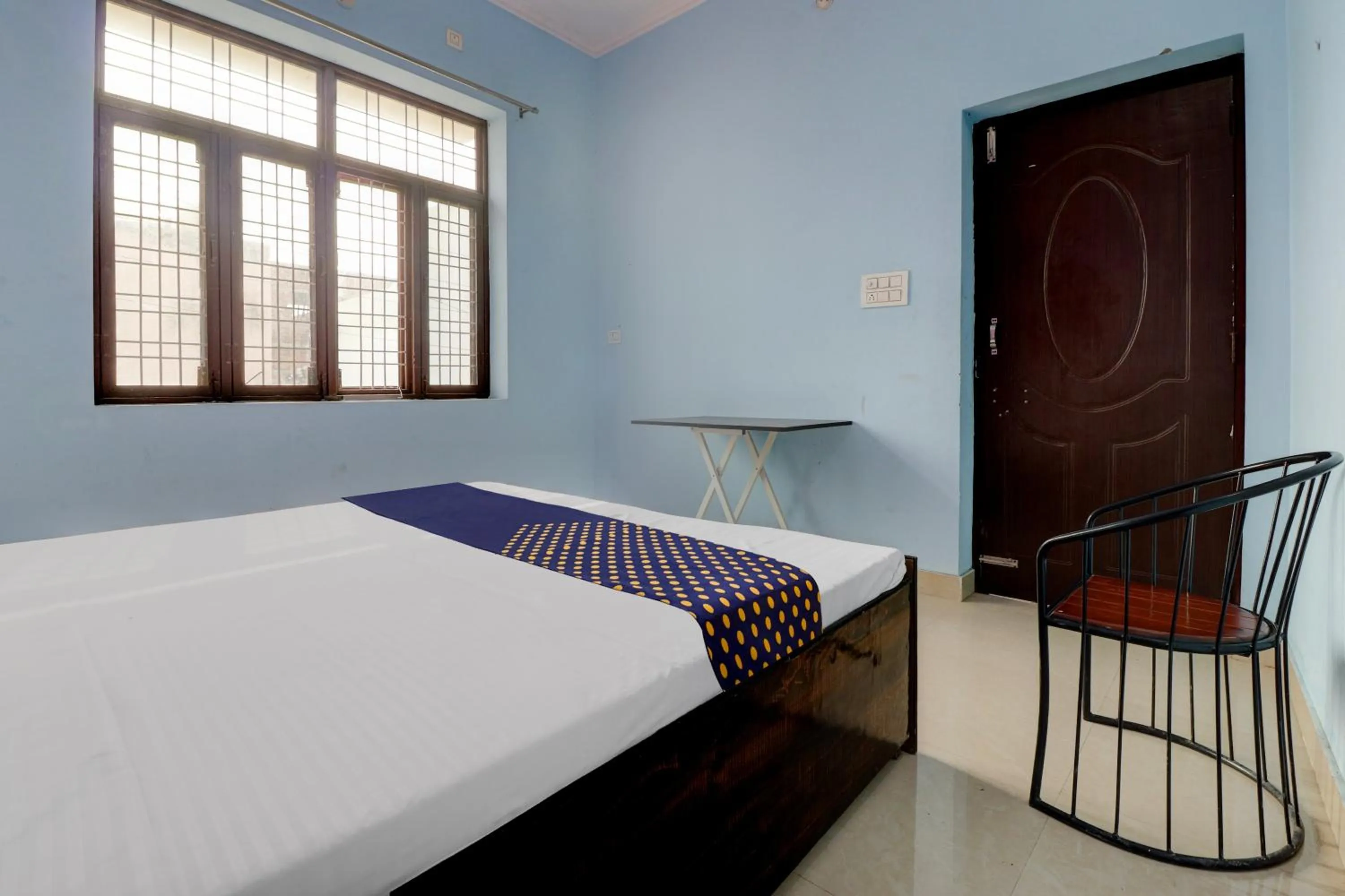 Bedroom in Hotel O Chaudhary Guest House