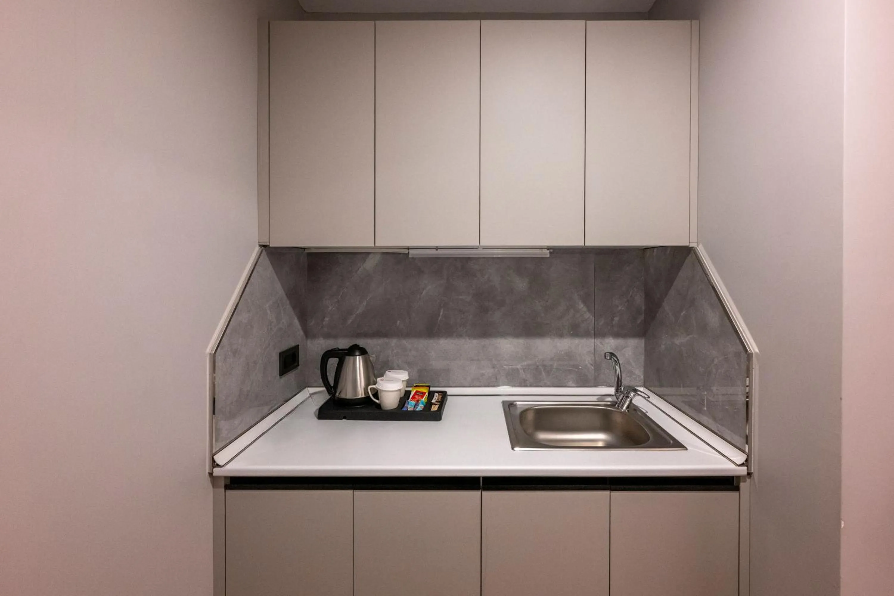 Kitchen or kitchenette in Ramada Encore by Wyndham Istanbul Sisli