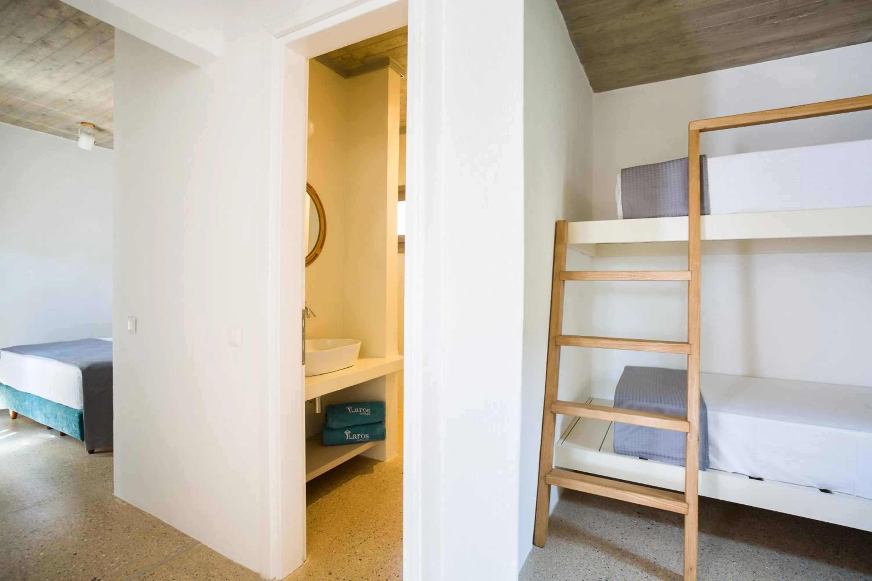 Photo of the whole room, Bed in Flaros Village