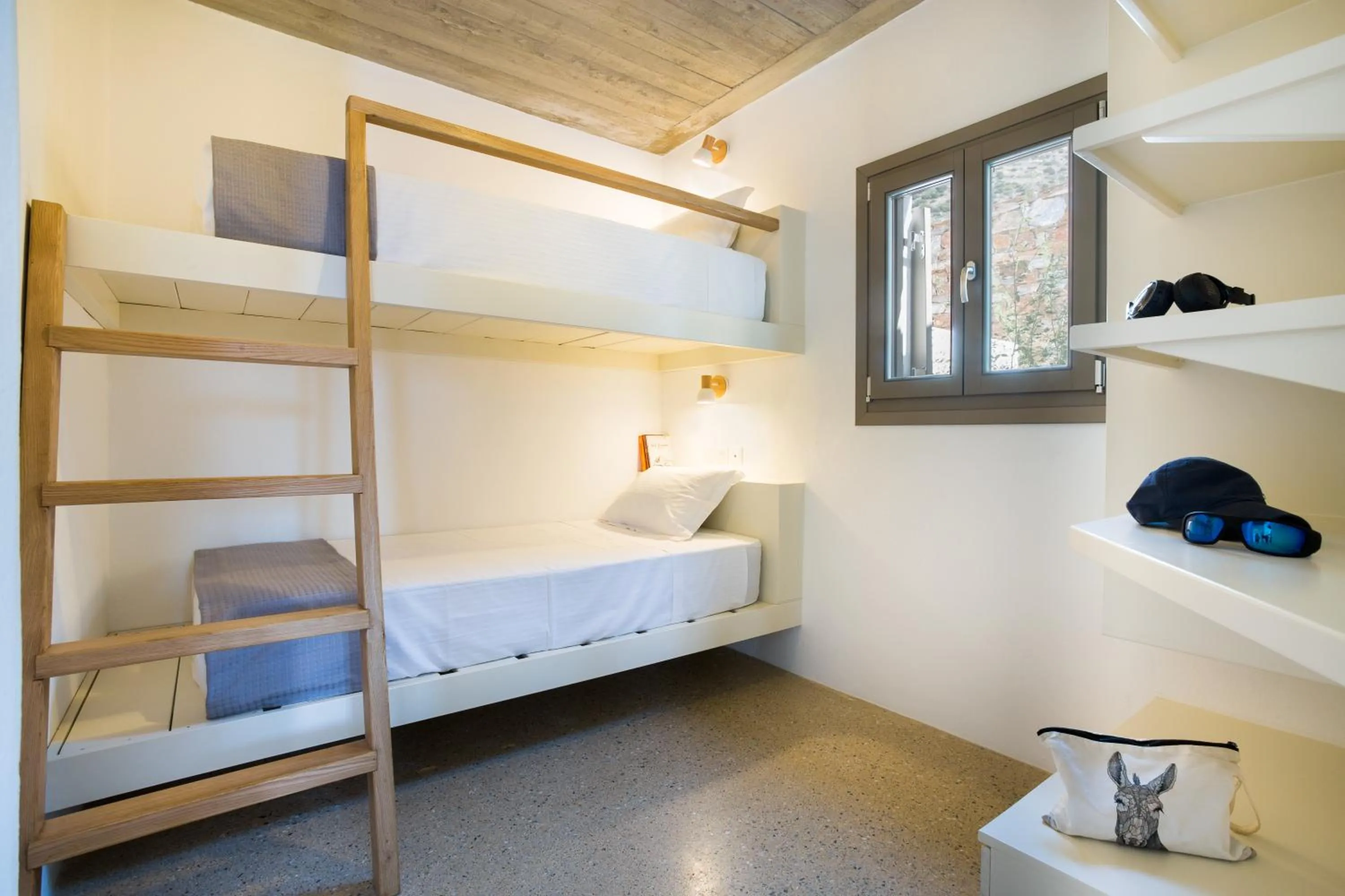 Photo of the whole room, Bed in Flaros Village