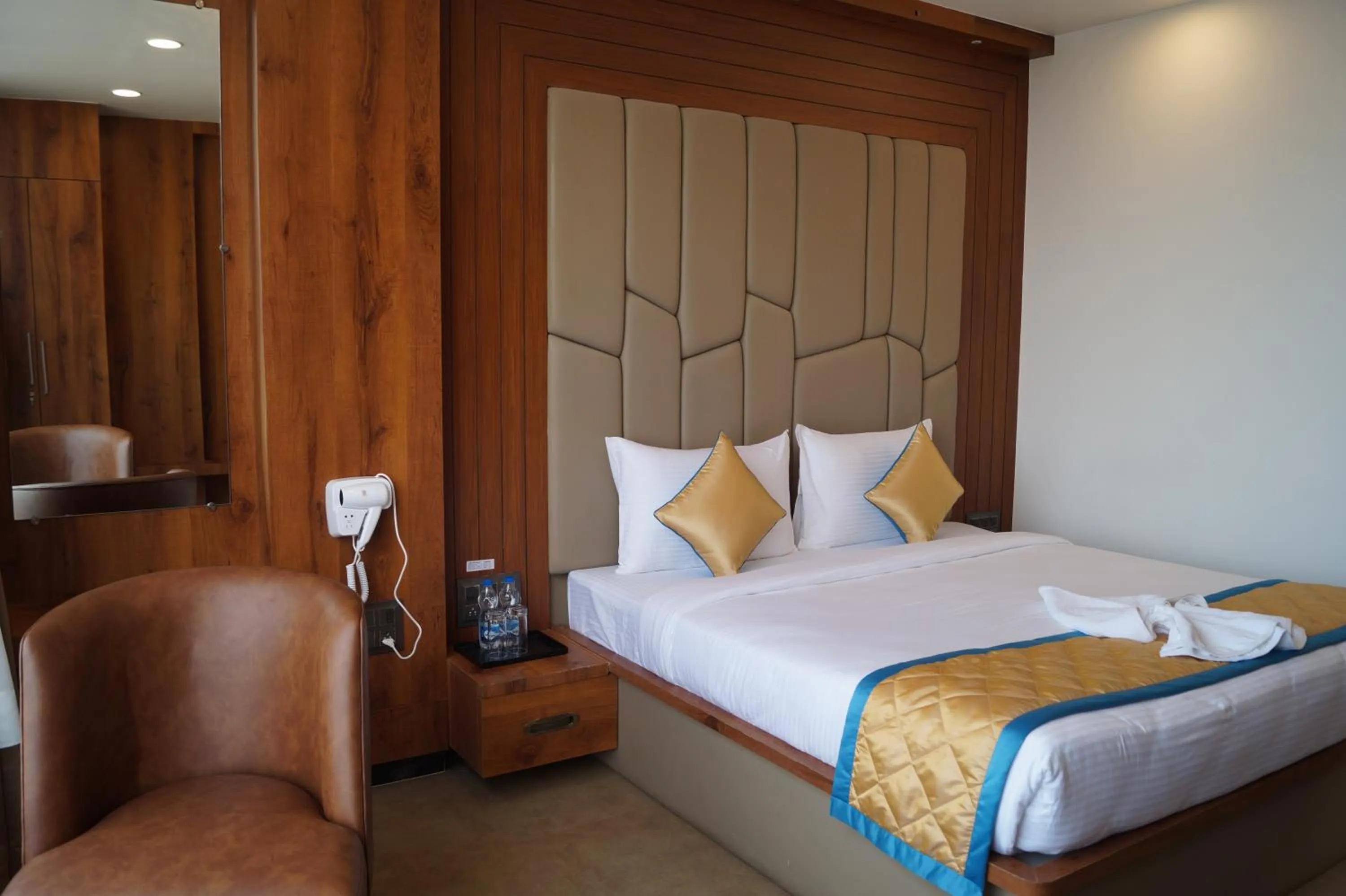 Bed in Hotel Varun Mansion Hassan