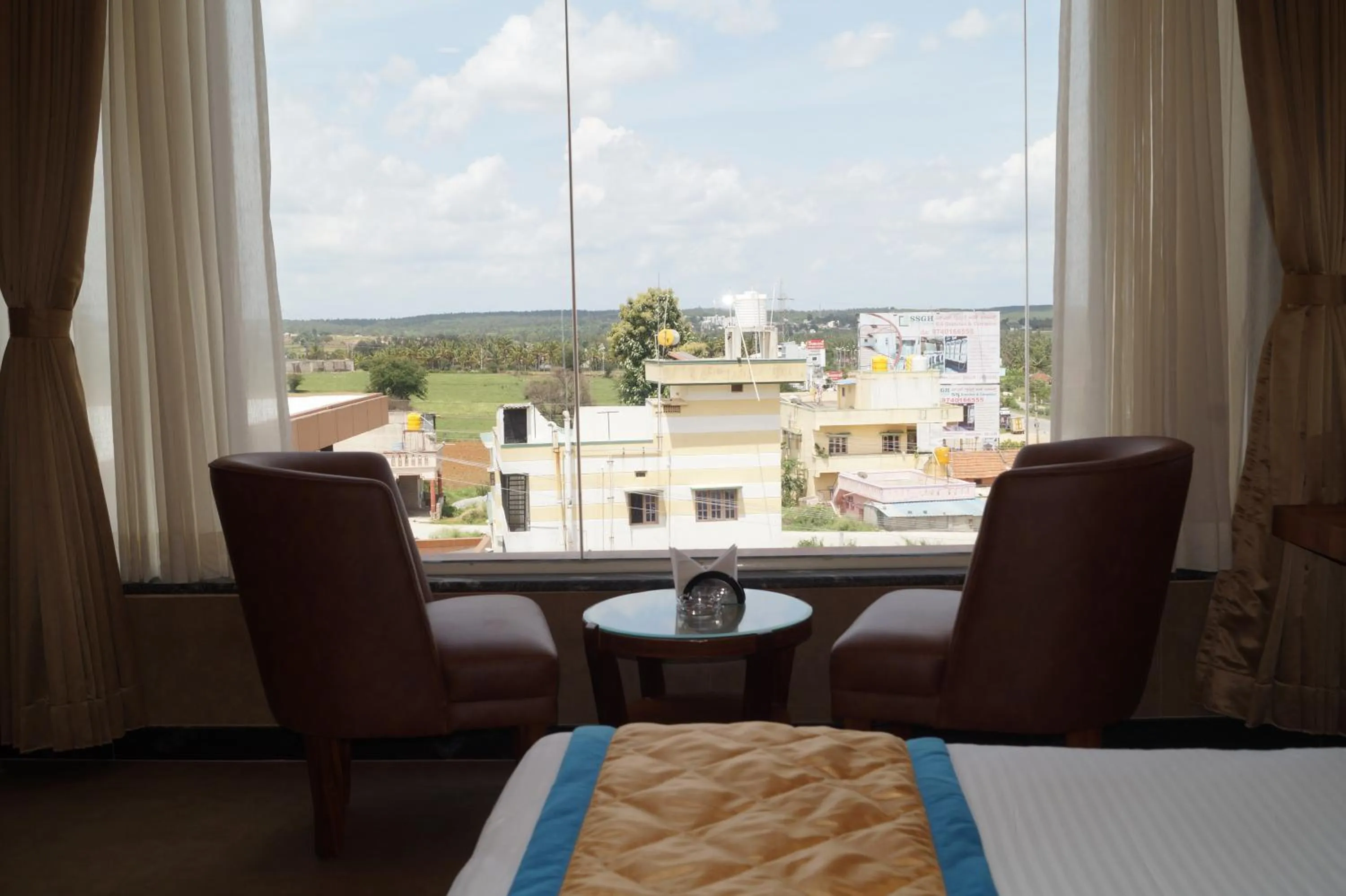 Bed in Hotel Varun Mansion Hassan