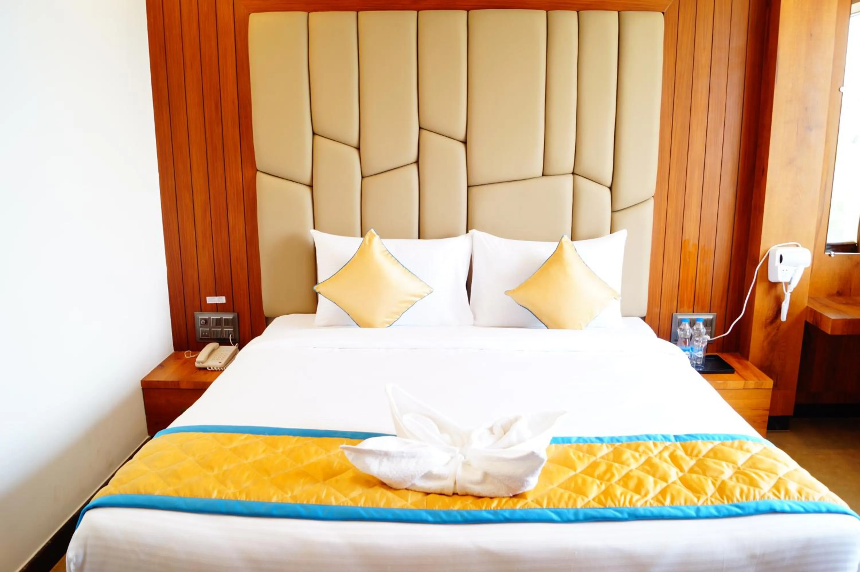 Bed in Hotel Varun Mansion Hassan