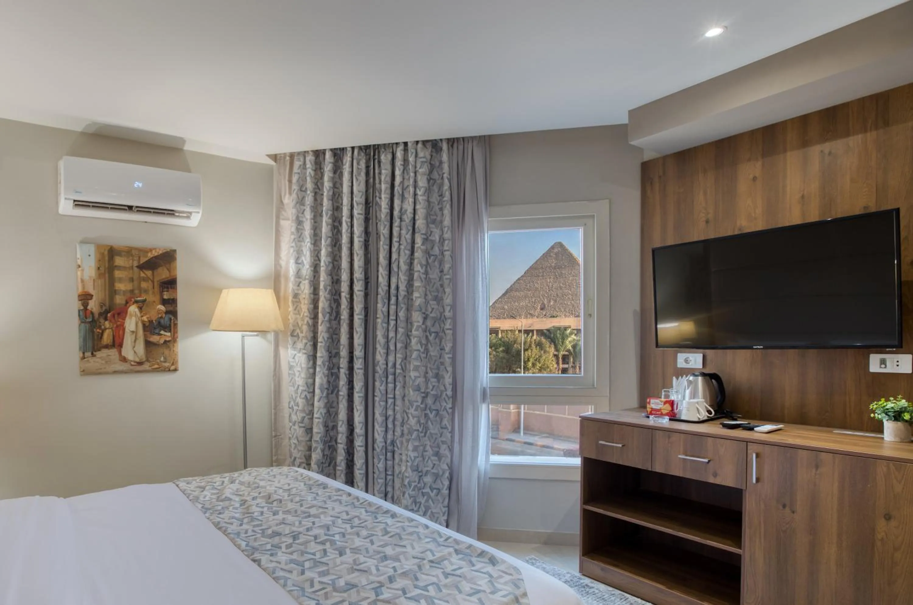 Bed in Nozol Pyramids Hotel and Spa