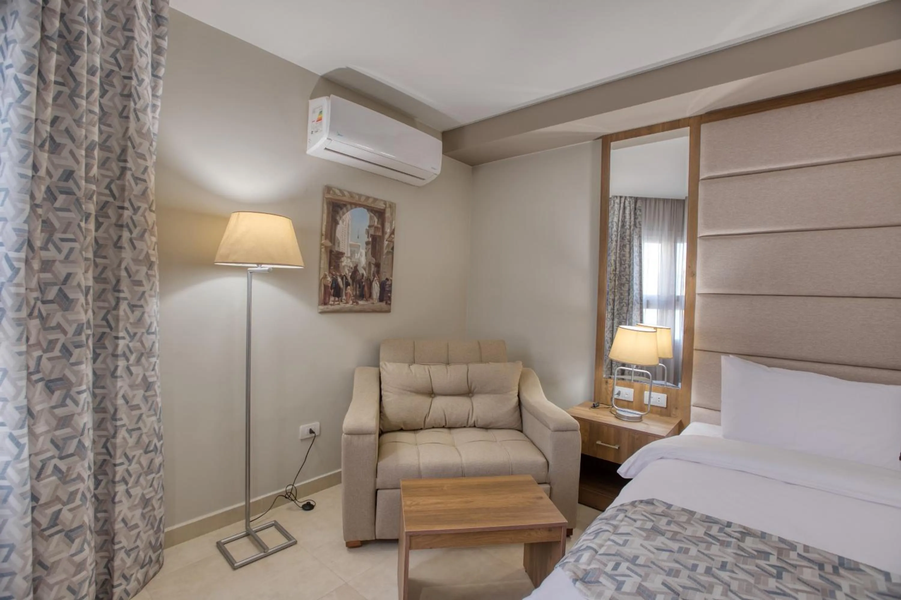 Bed in Nozol Pyramids Hotel and Spa