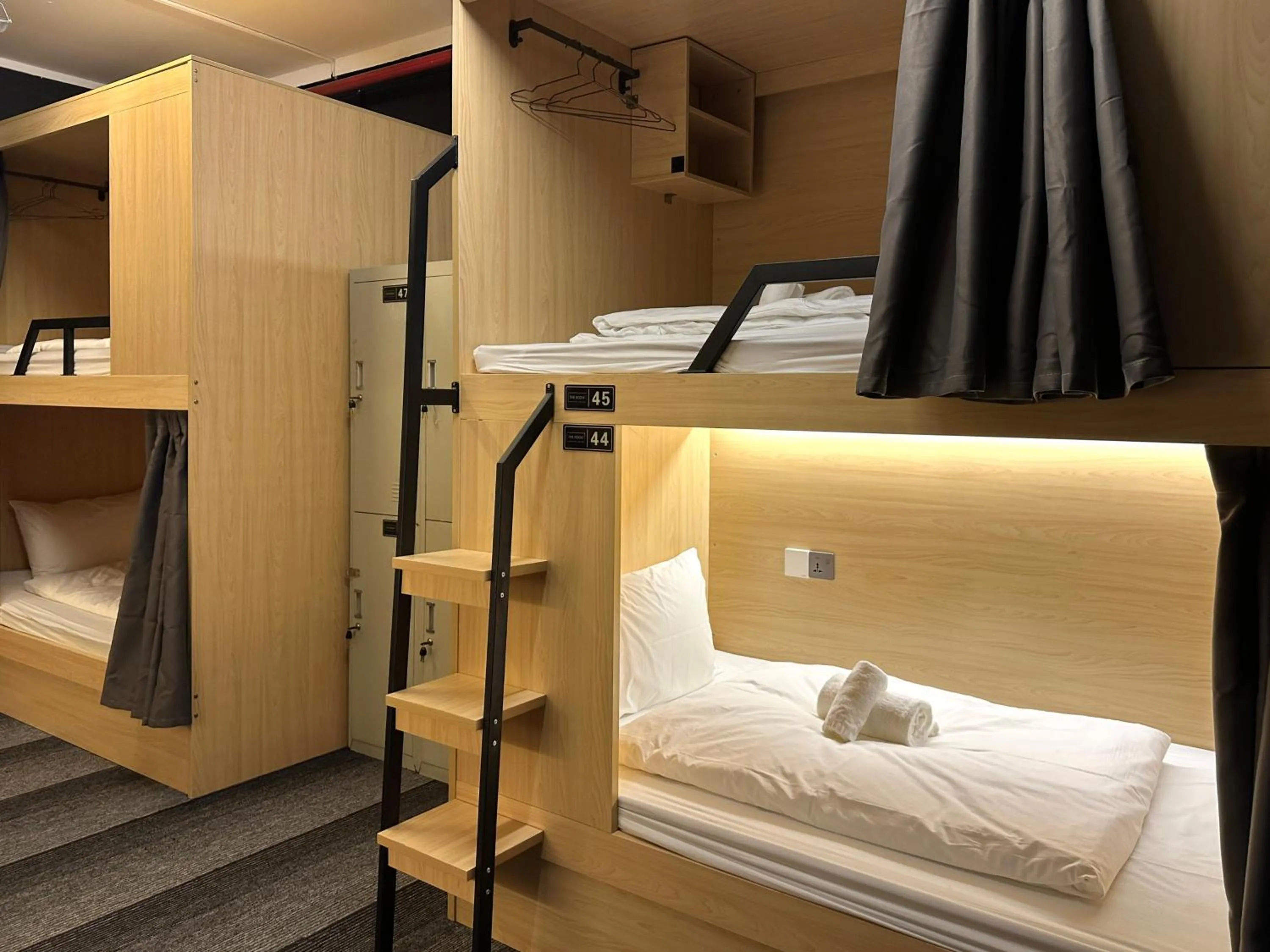 Bed in THE ROOM Capsule Hotel