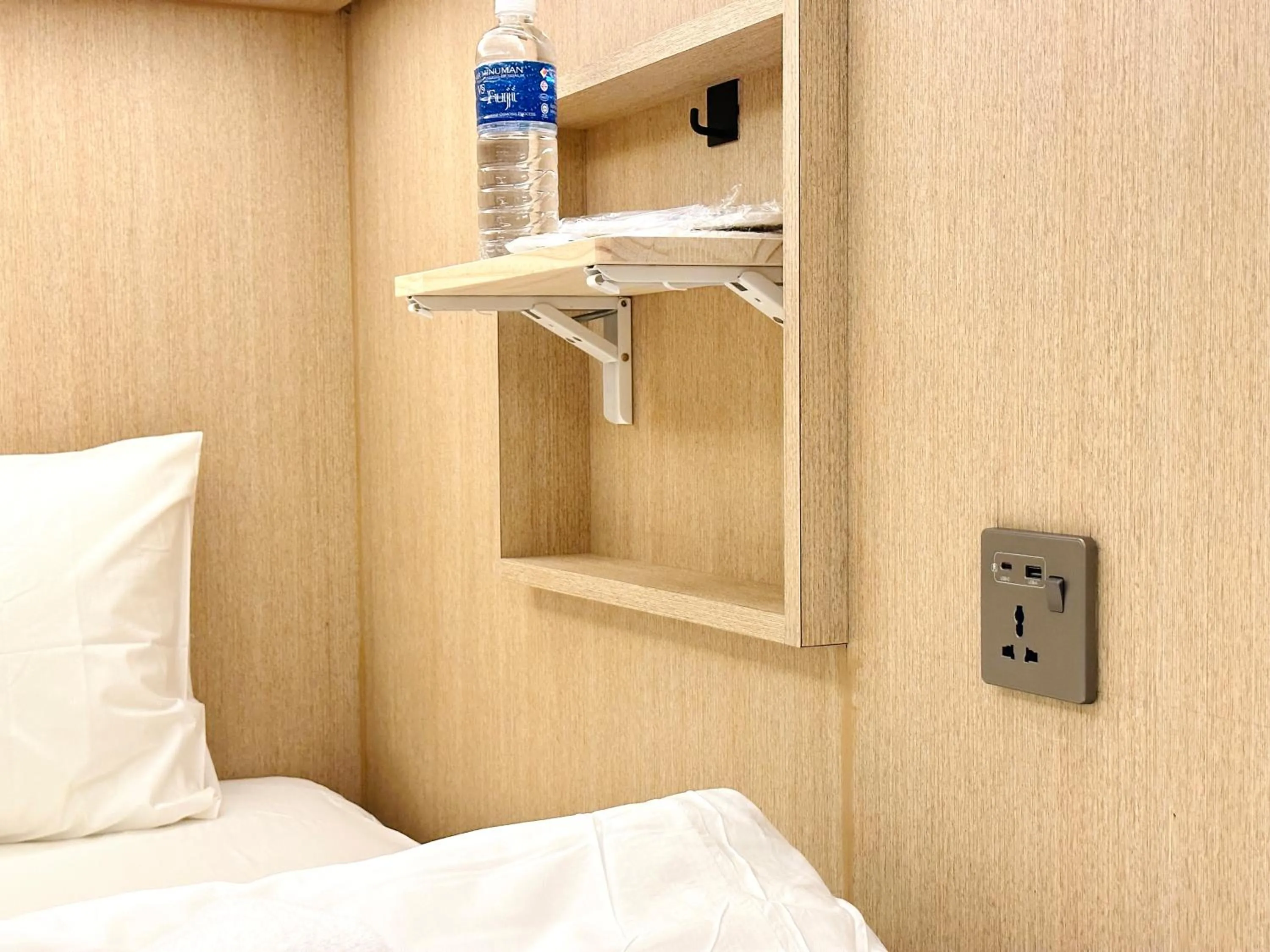 Bed in THE ROOM Capsule Hotel