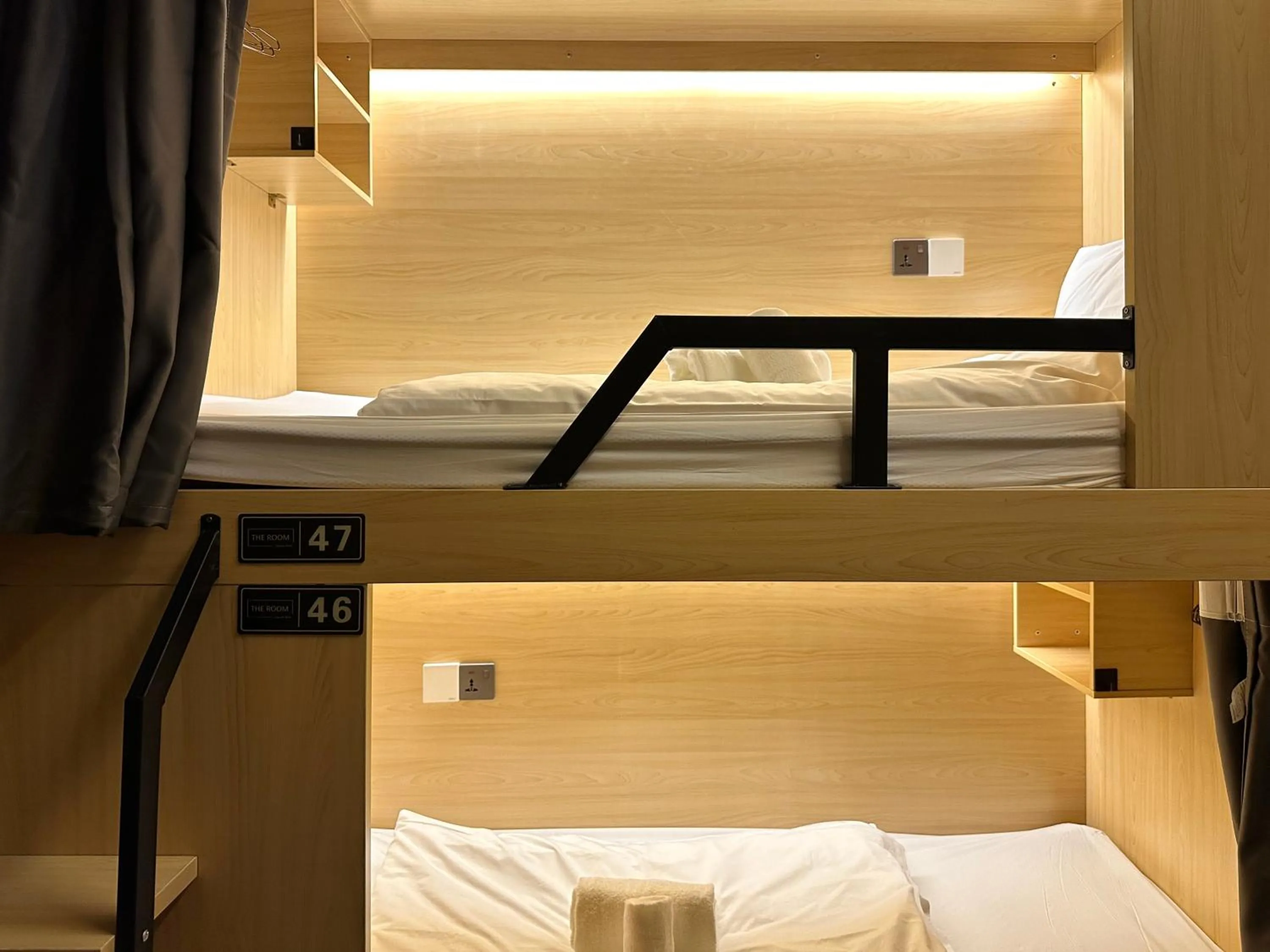 Bed in THE ROOM Capsule Hotel