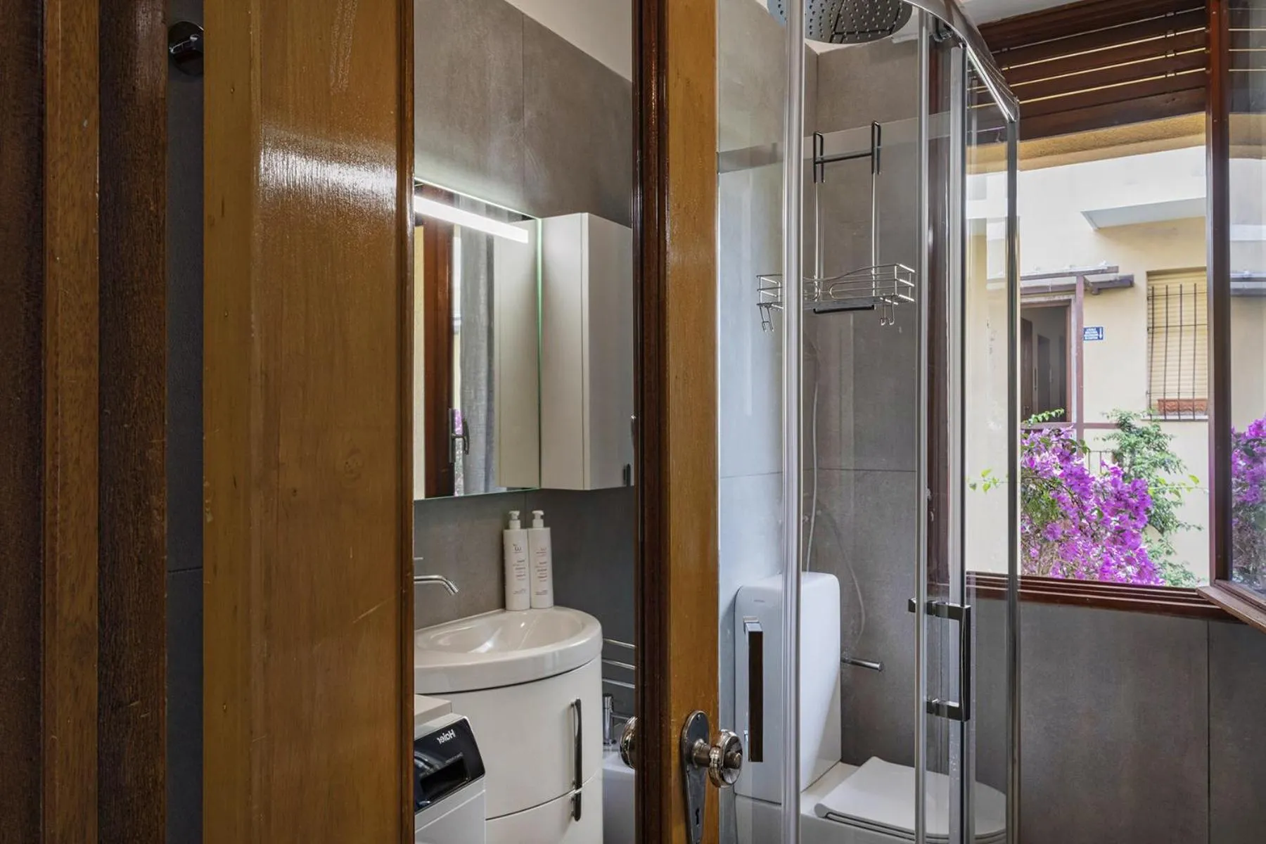 Bathroom in Mondial Apartment by Wonderful Italy