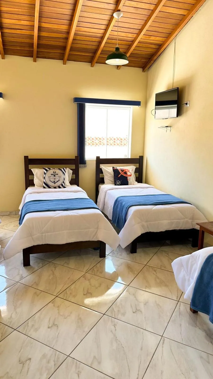 Bed in Pousada Antares de Paraty