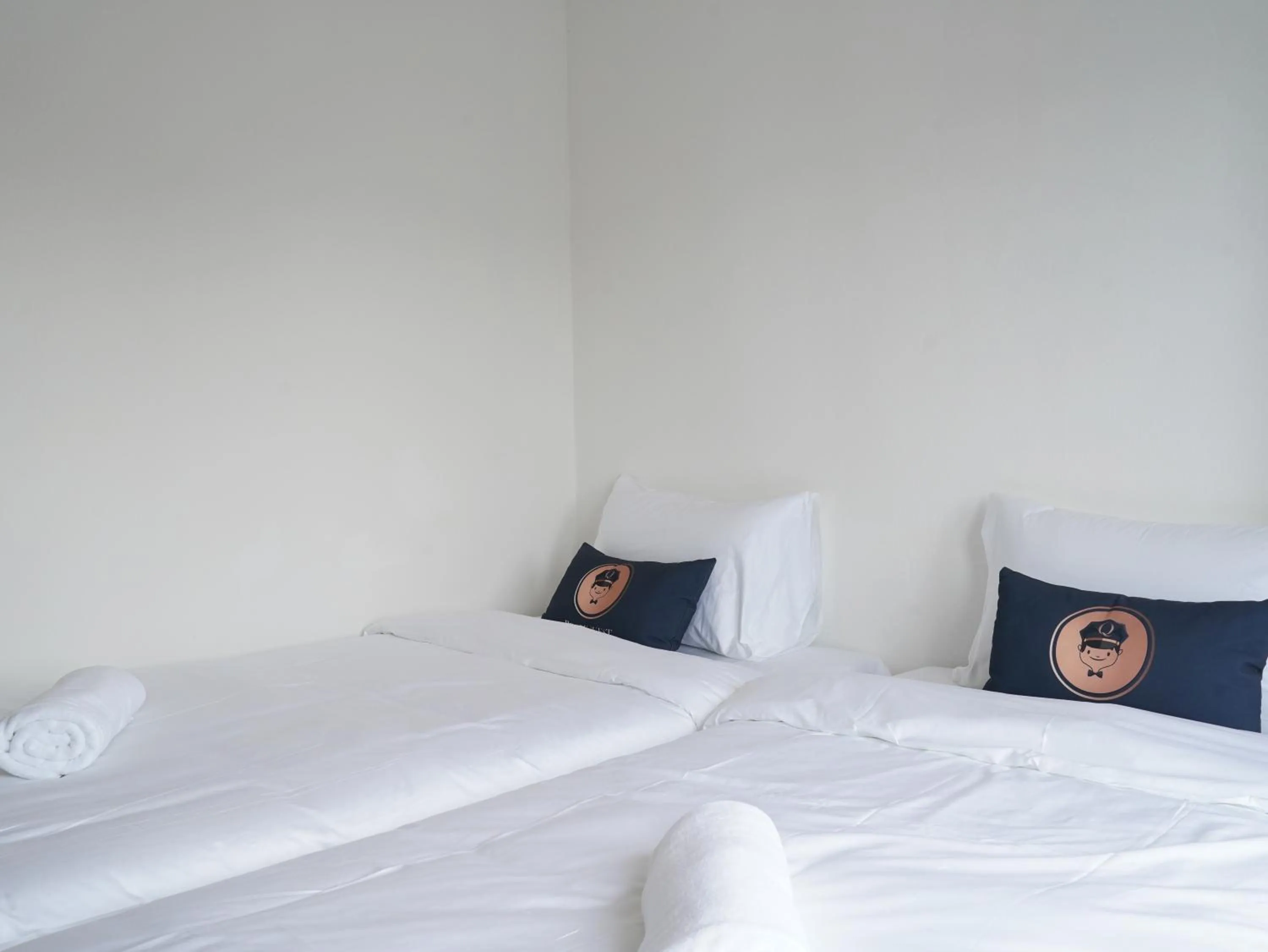 Bed in RoomQuest IT Square Don Mueang Airport