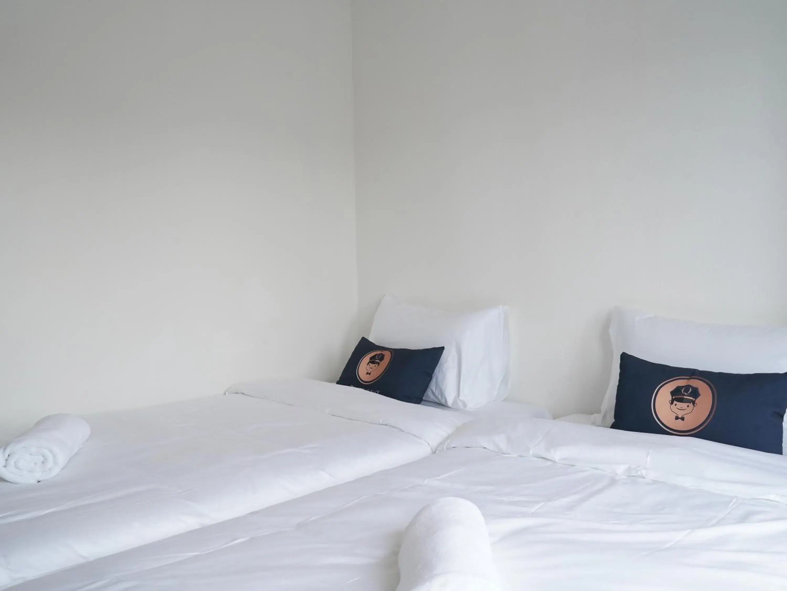 Bed in RoomQuest IT Square Don Mueang Airport Bed in RoomQuest IT Square Don Mueang Airport