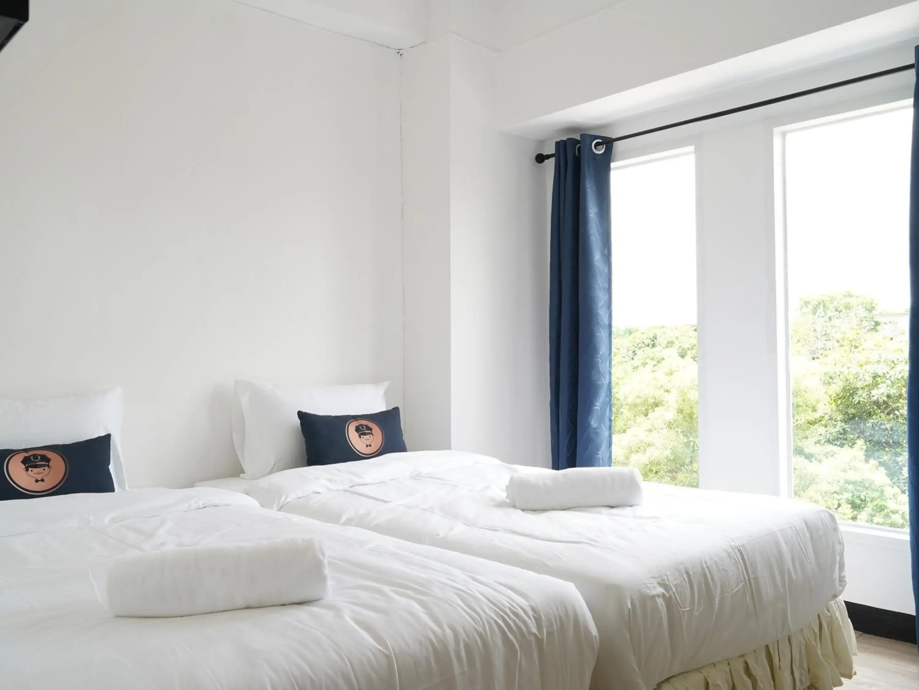 Bed in RoomQuest IT Square Don Mueang Airport Bed in RoomQuest IT Square Don Mueang Airport