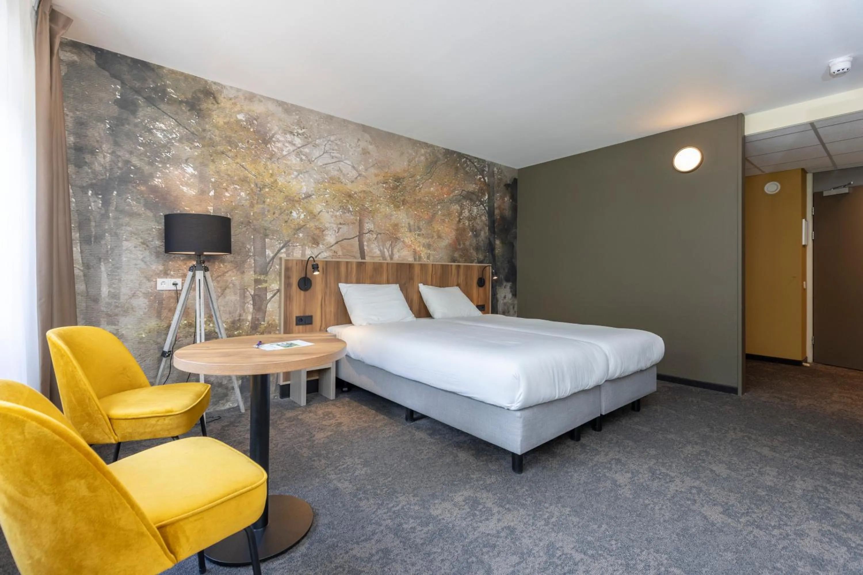 Photo of the whole room, Bed in Fletcher Hotel Restaurant Erica